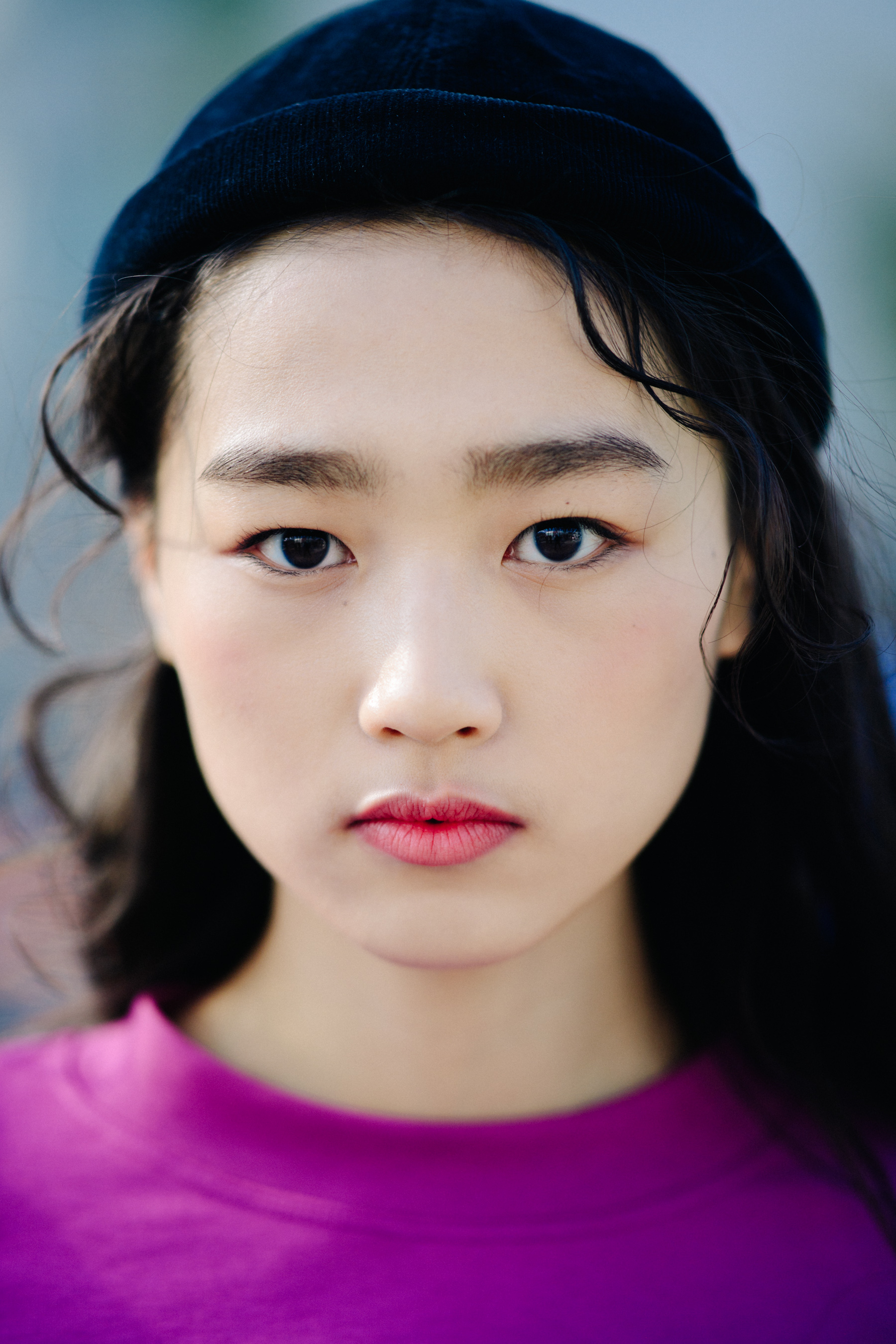 Portrait of model with navy beanie