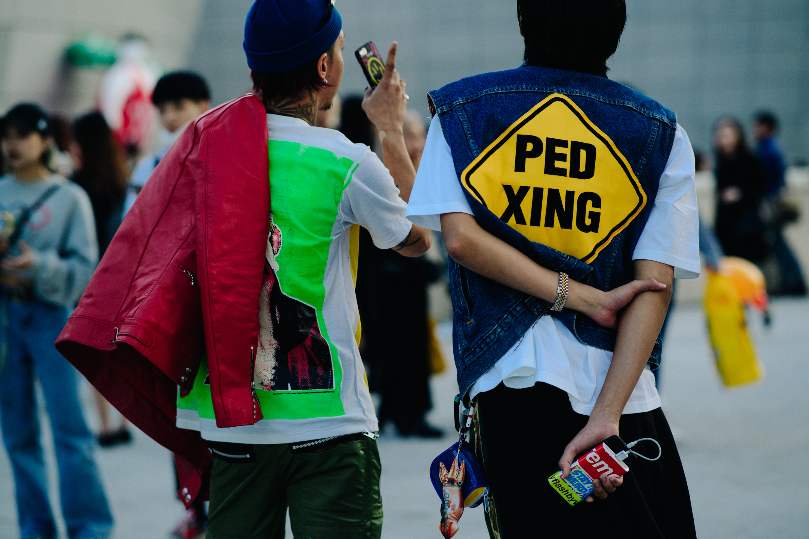 Two men in colourful back print tee shirts