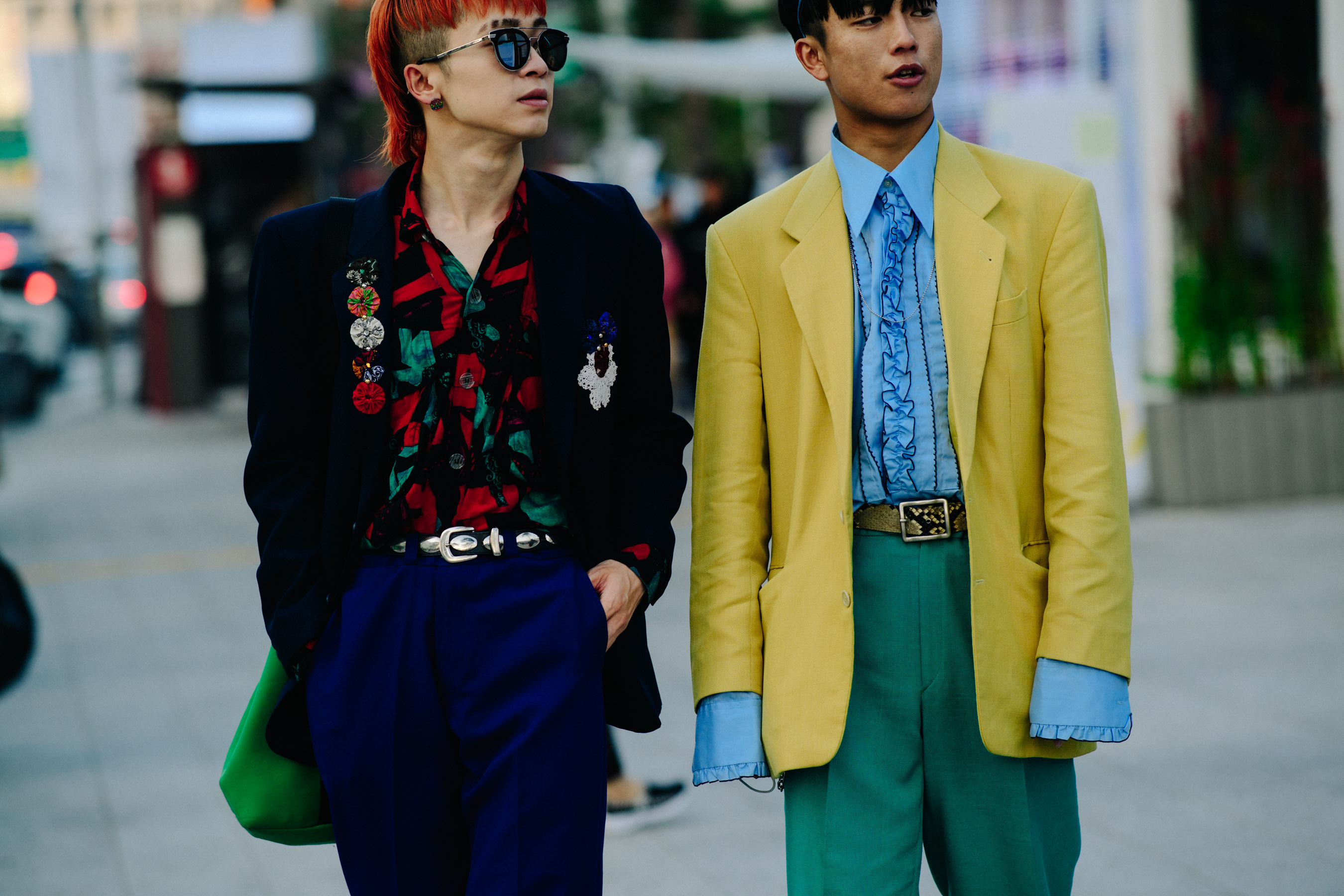 Two men in colourful outfits