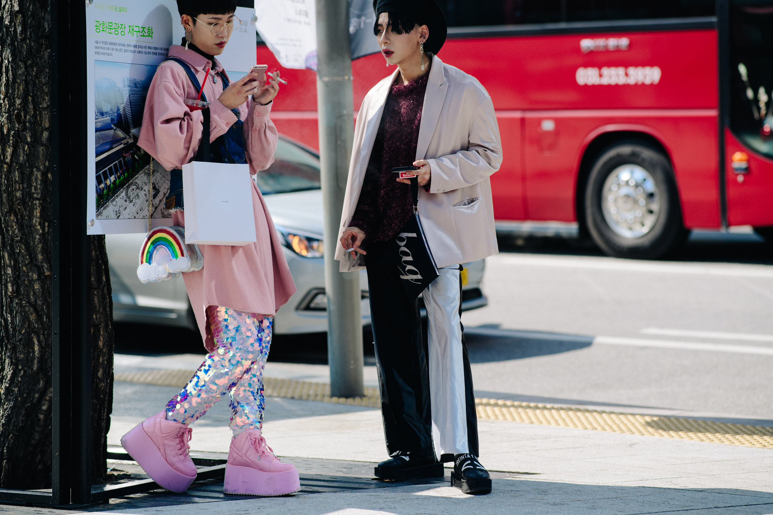 Two women wearing pink