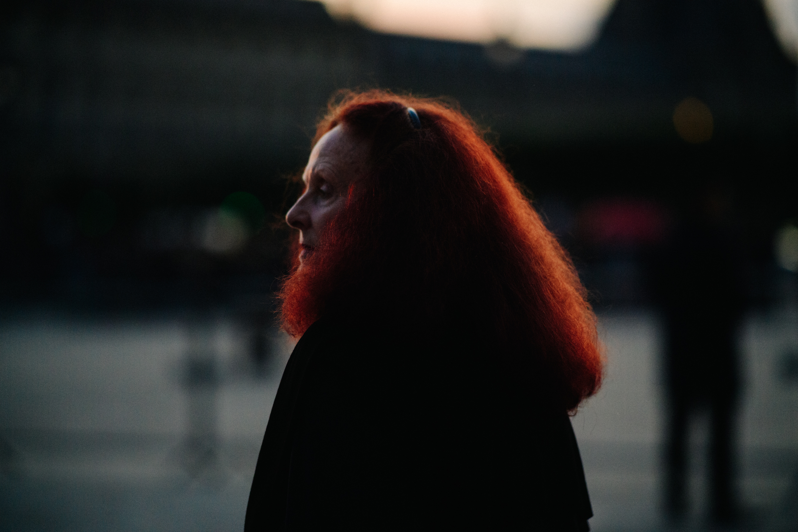 American stylist with long red hair