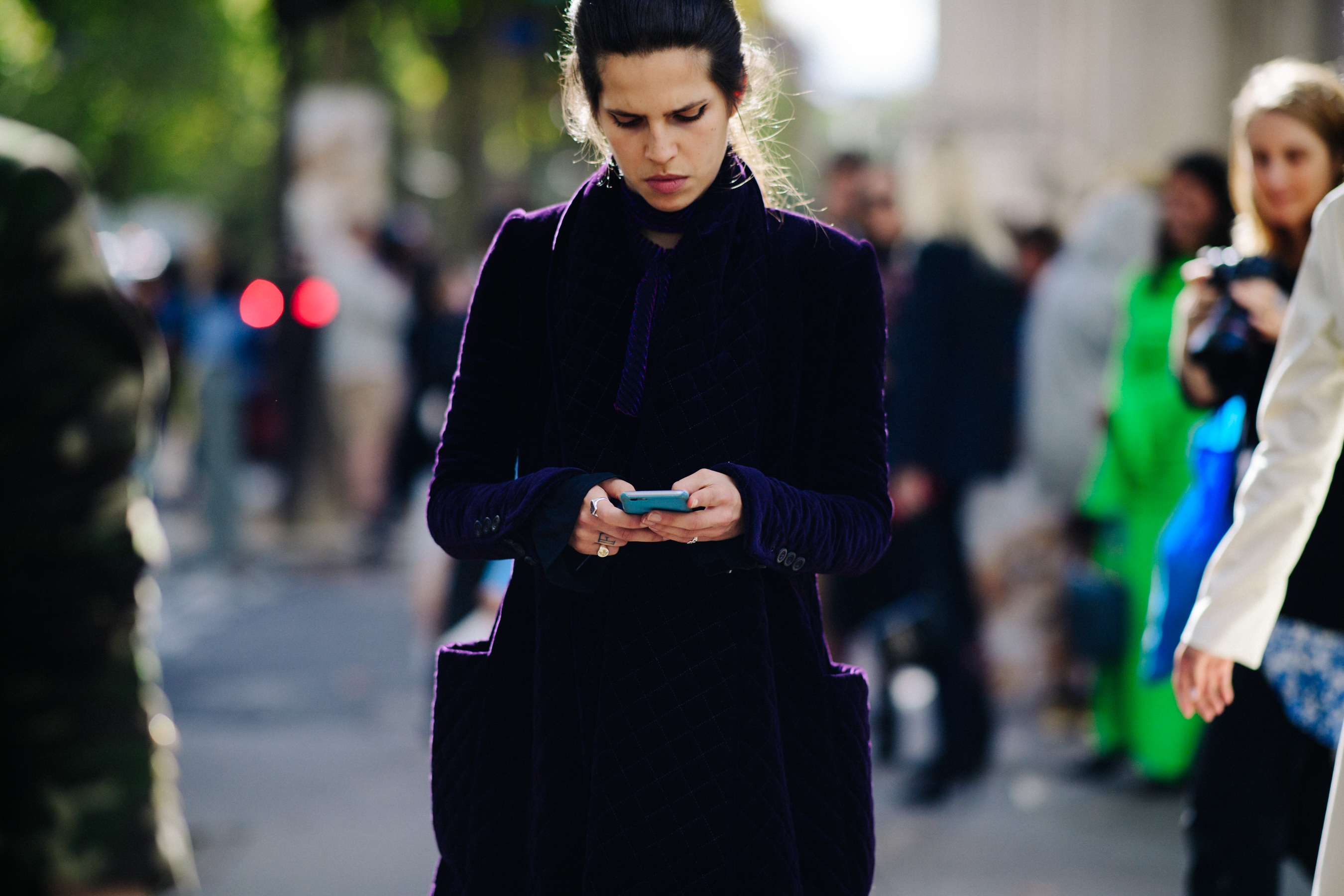 Model wearing purple coat