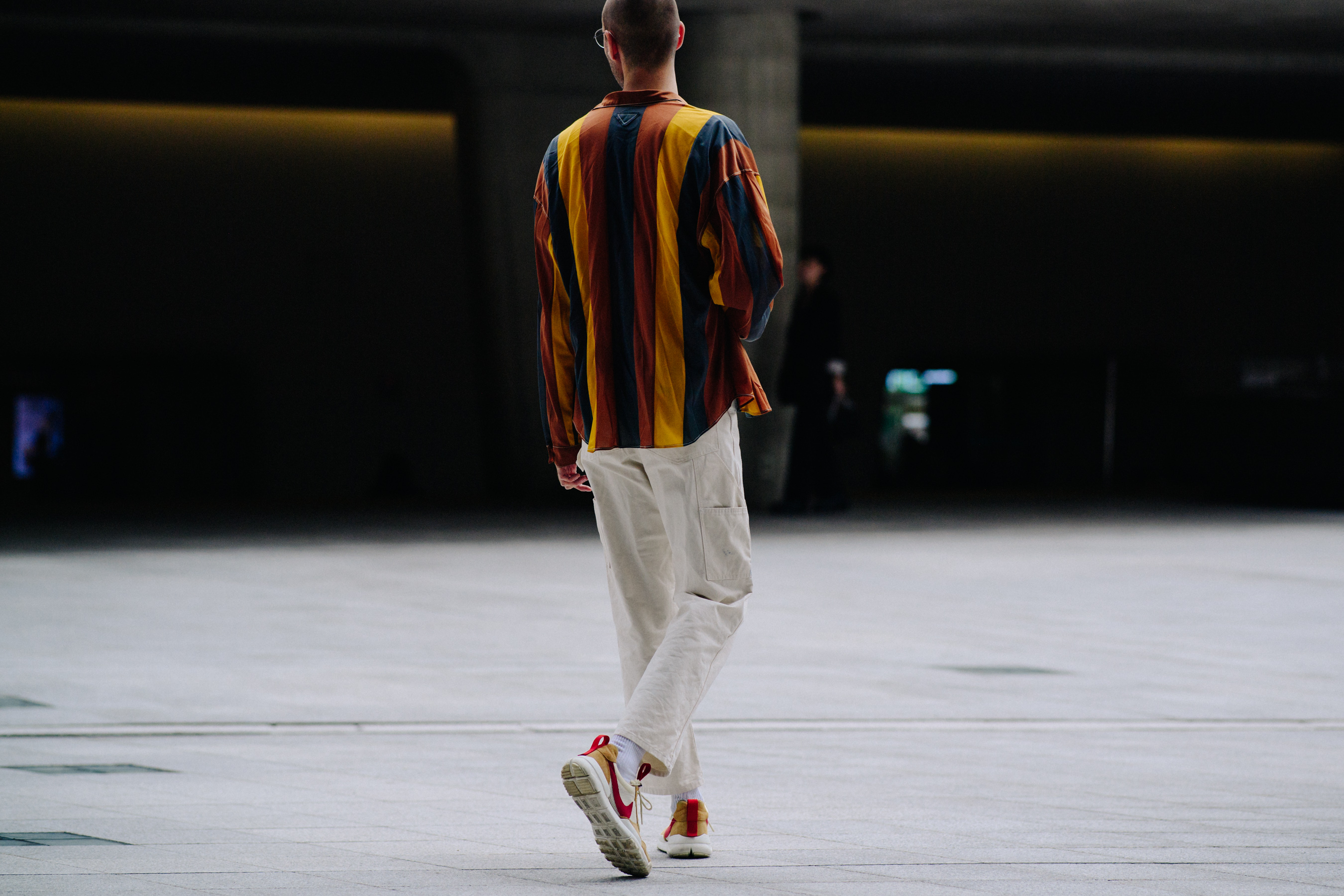 Man wearing striped Autumnal colour shirt