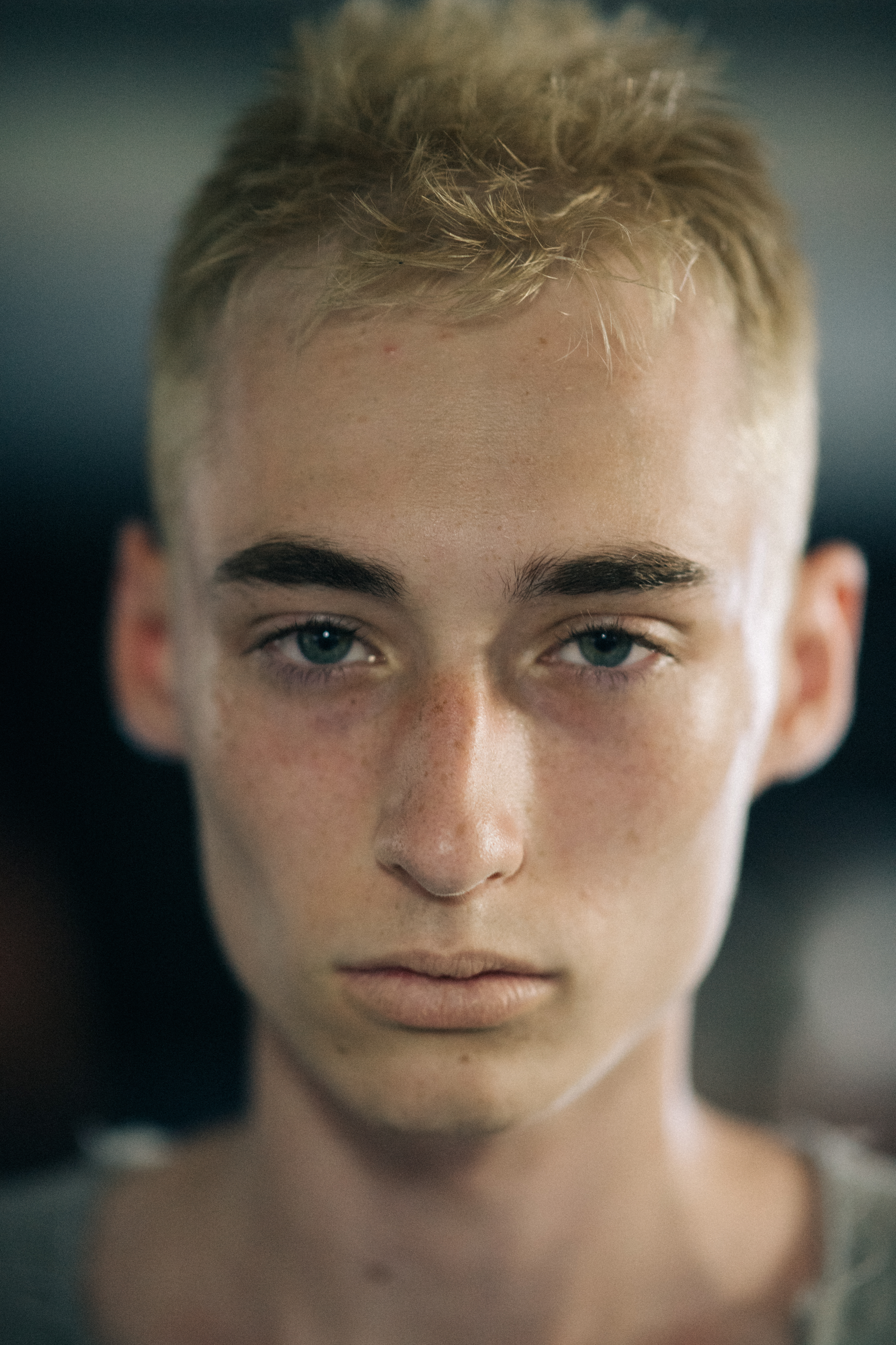 Portrait of model with blonde hair and blue eyes