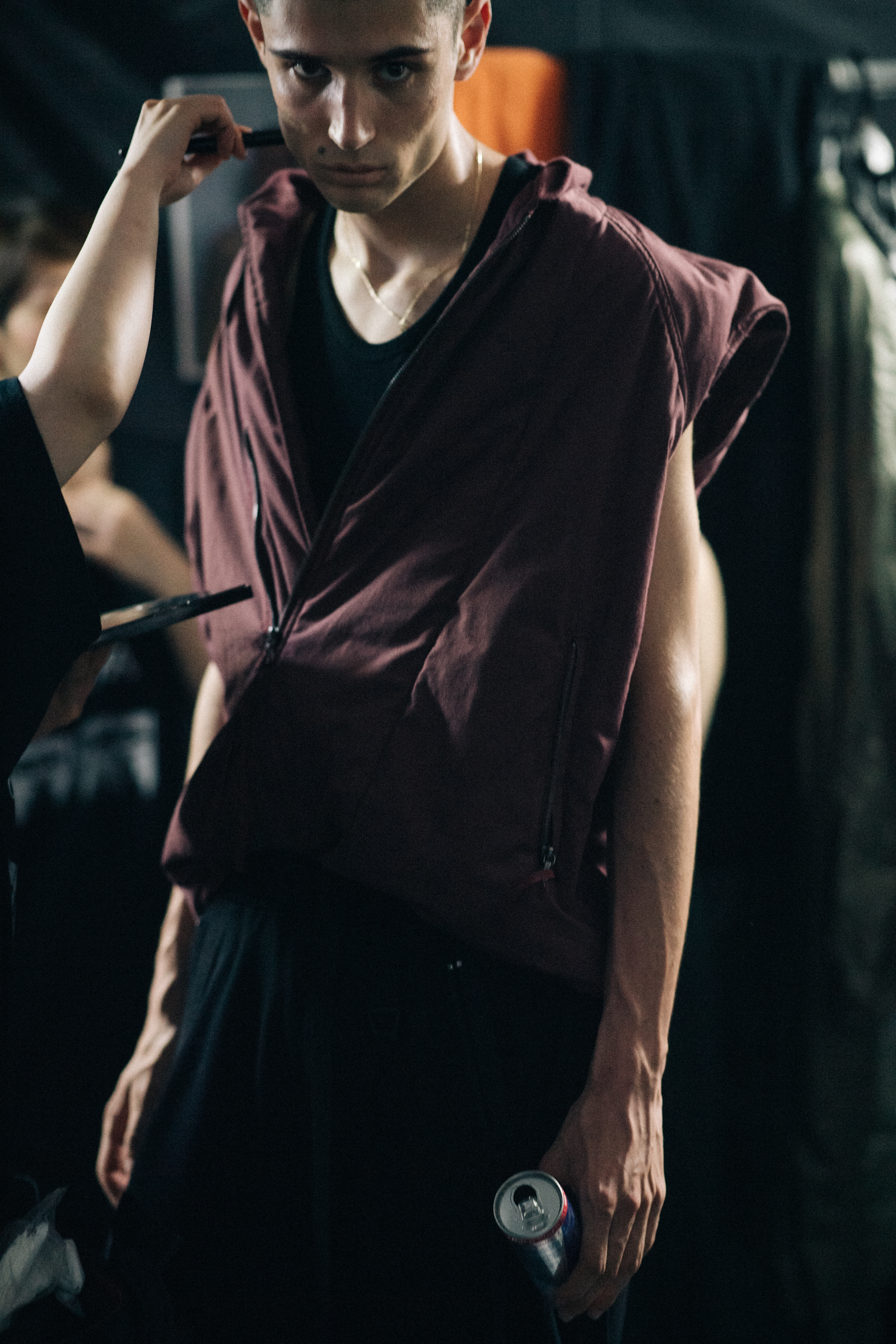 Model backstage in makeup prep
