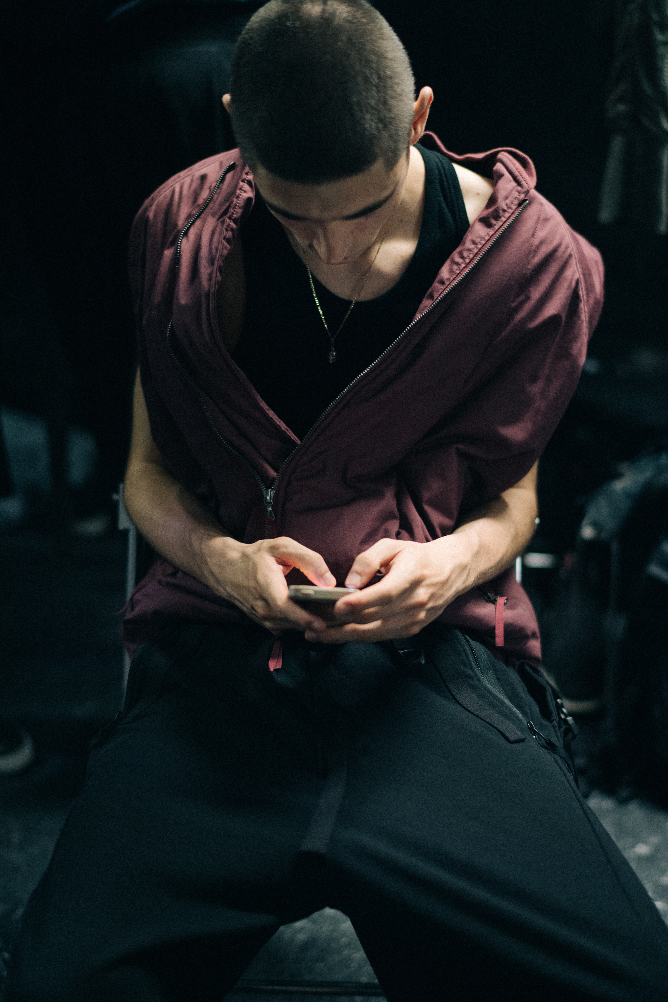 Model backstage on phone