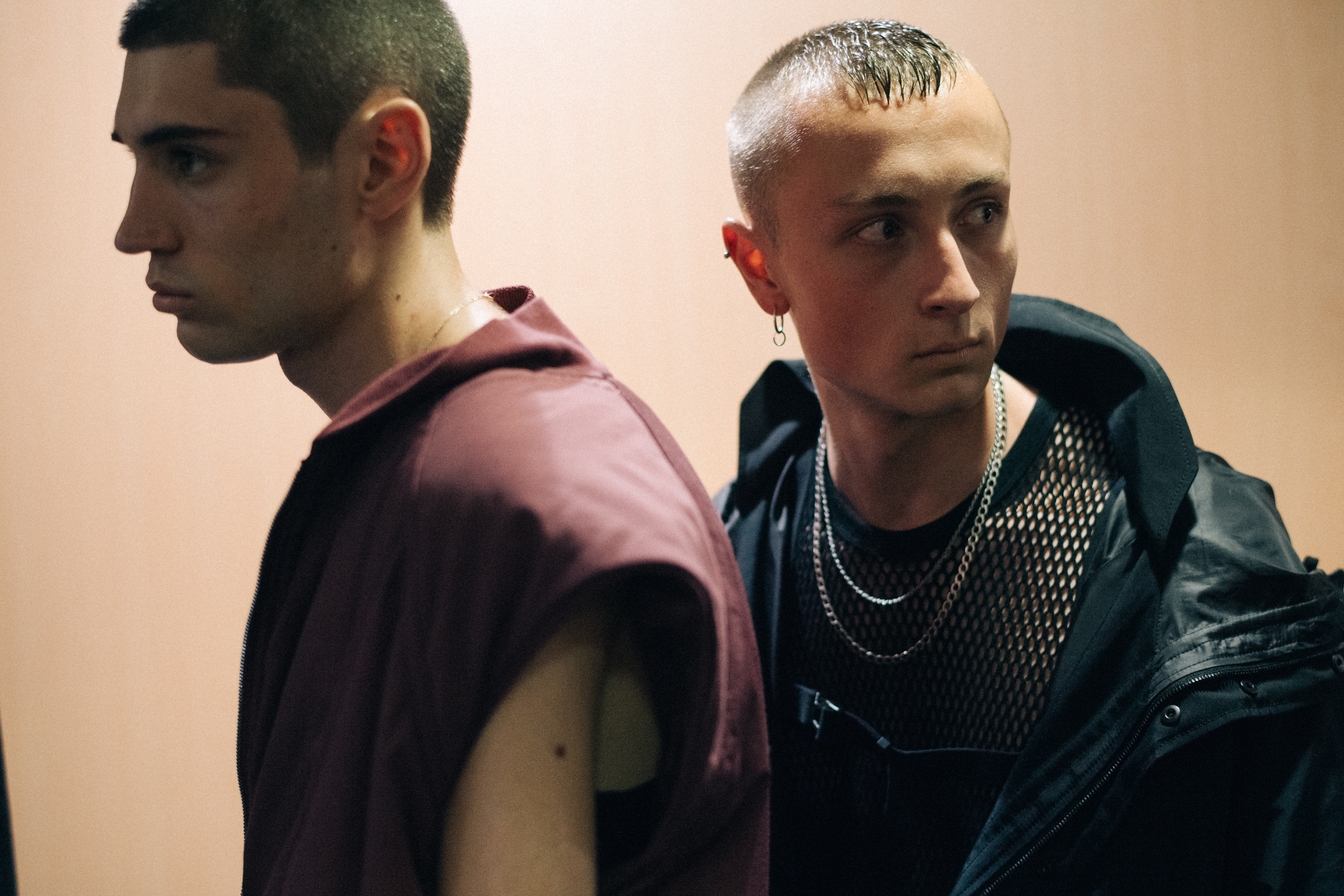 Two models with short hair