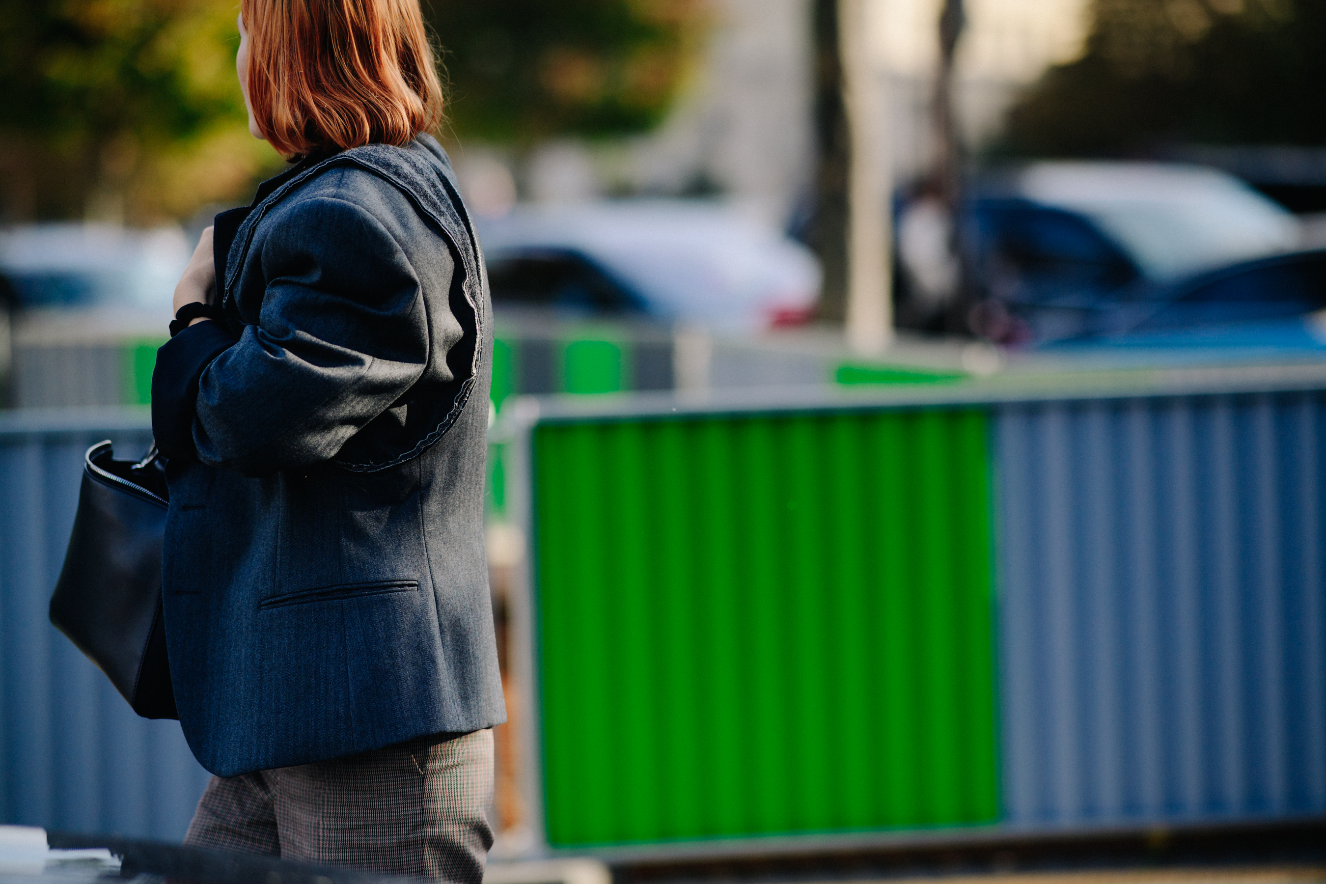 Woman wearing gray blazer
