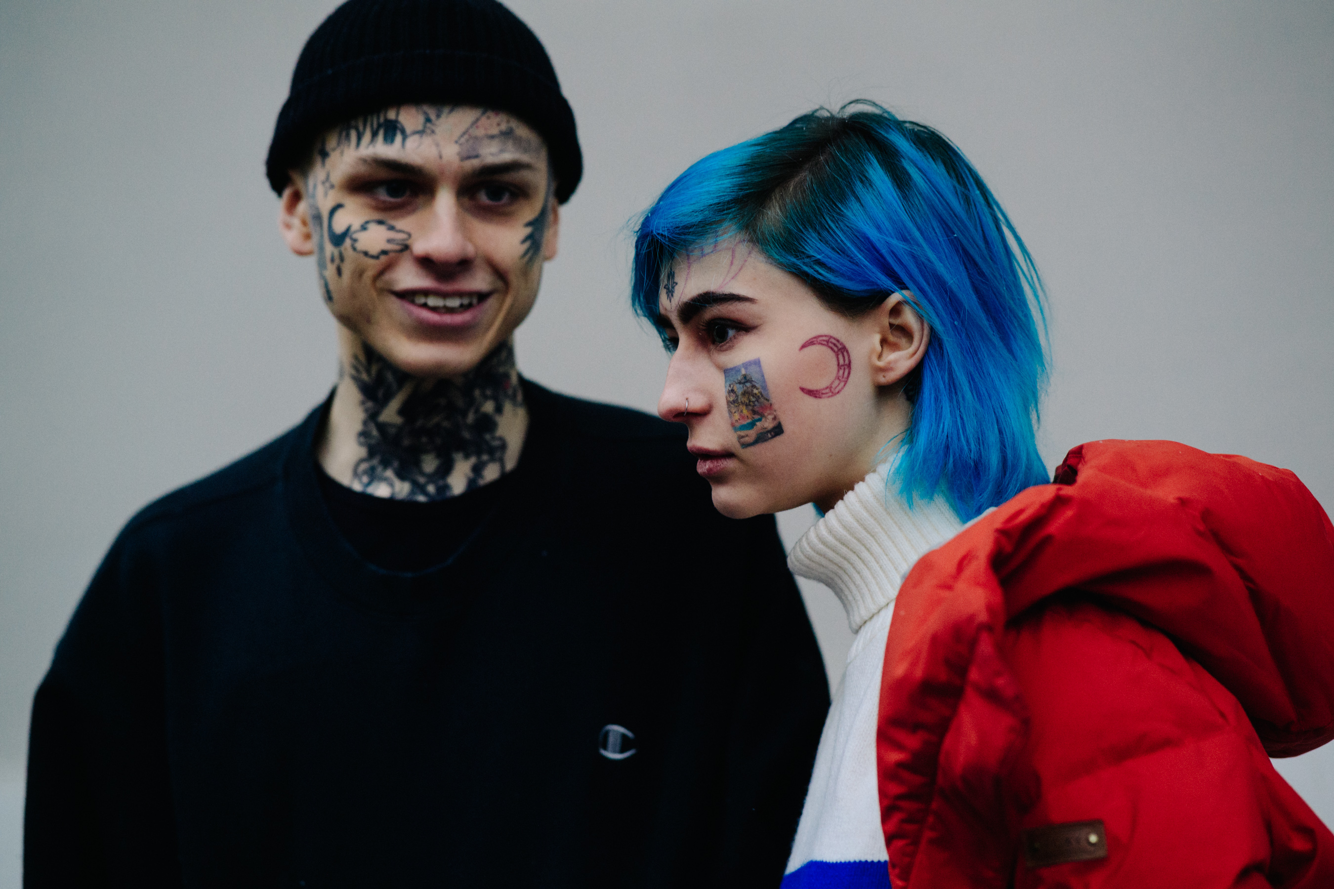 Couple with face tattoos