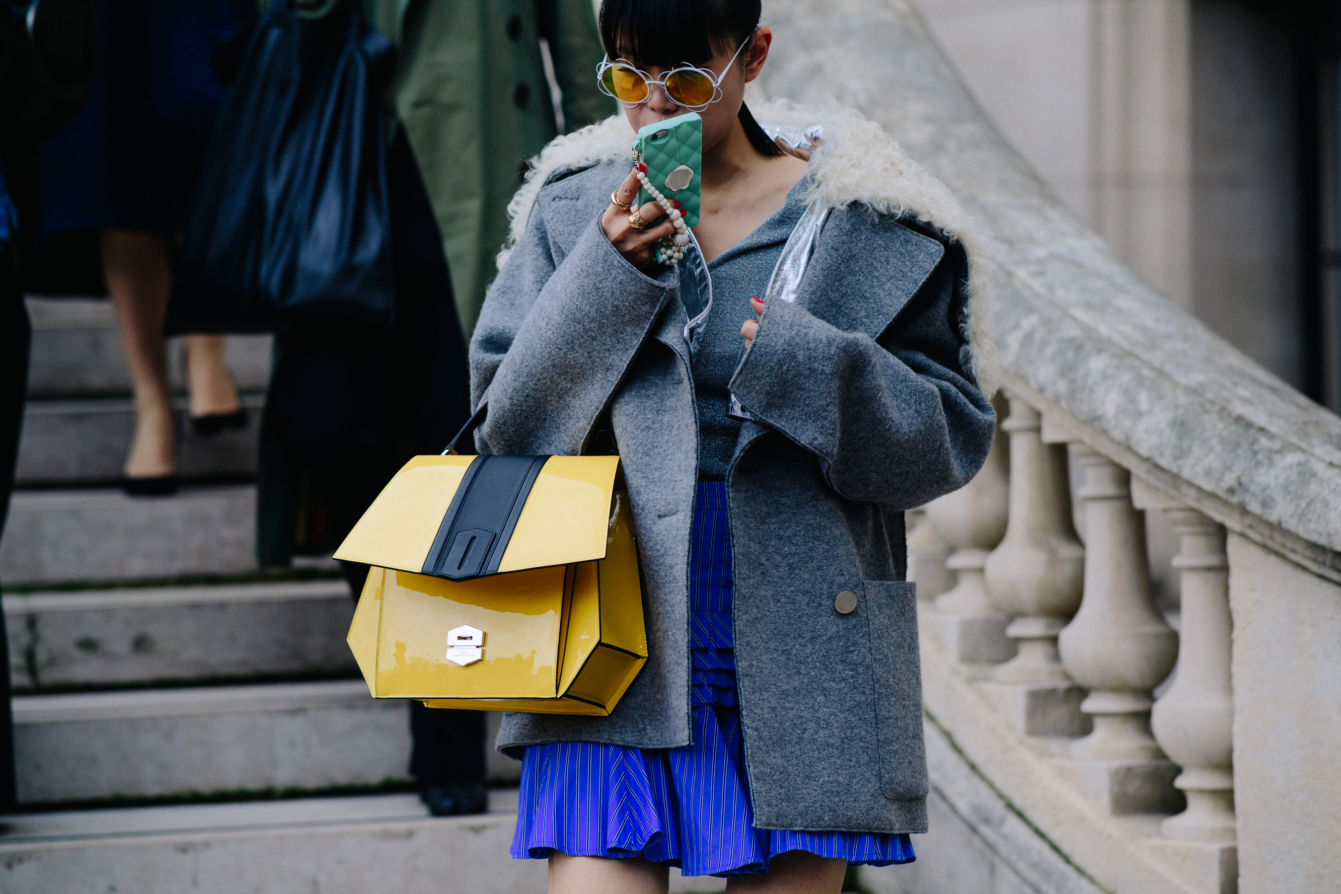 Woman wearing yellow bag