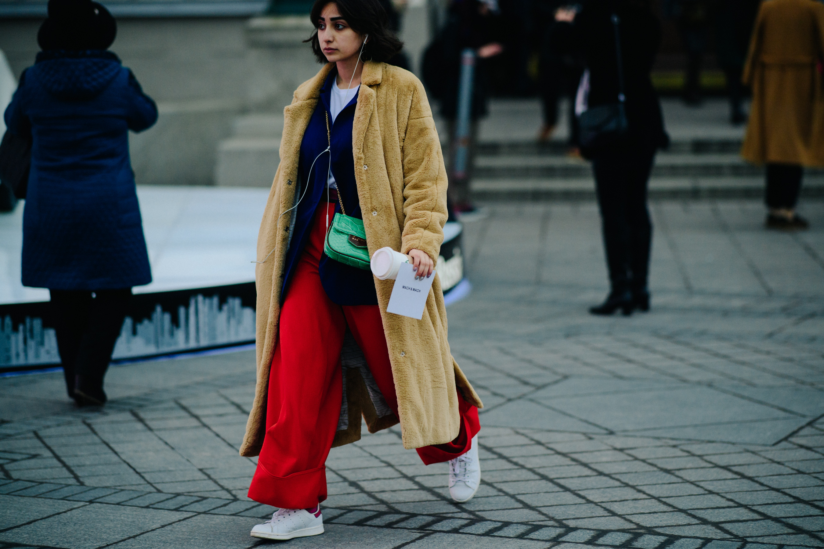 Woman in brown fur coat