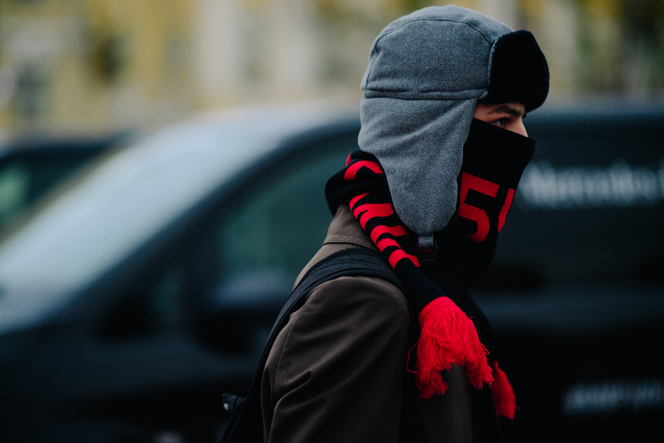 Man in grey trapper hat