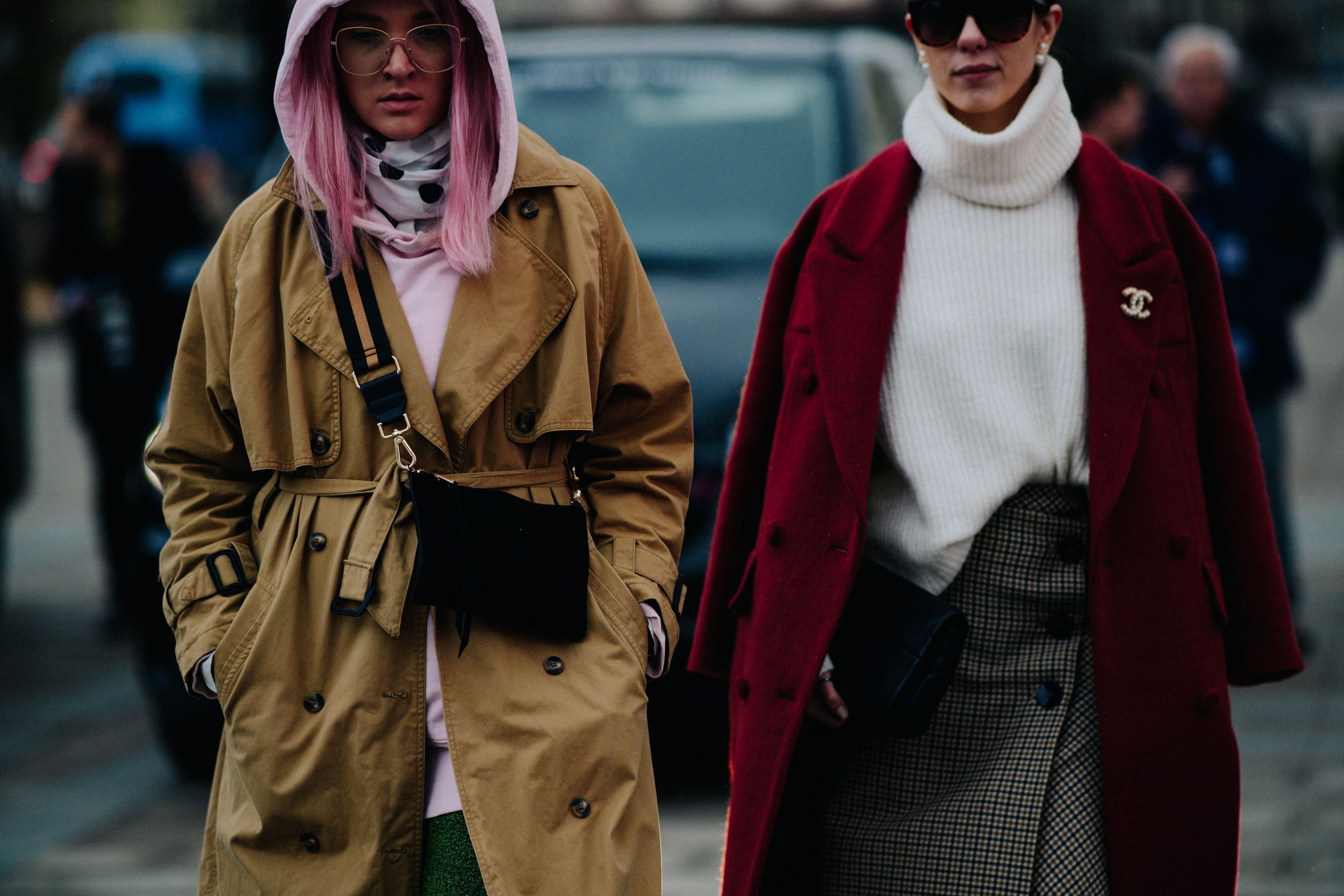 Two women in long coats