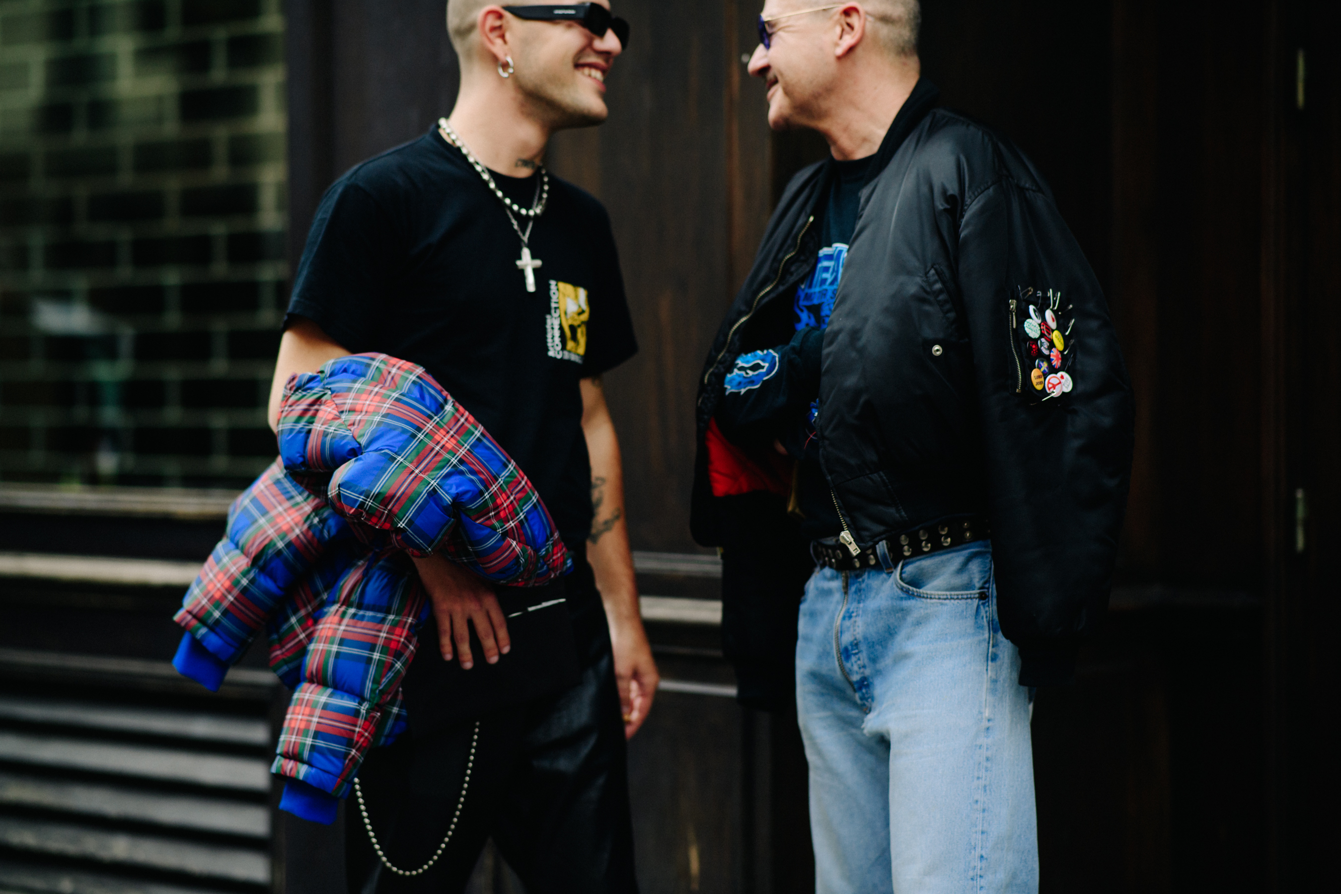 Two men wearing bomber and puffer jacket