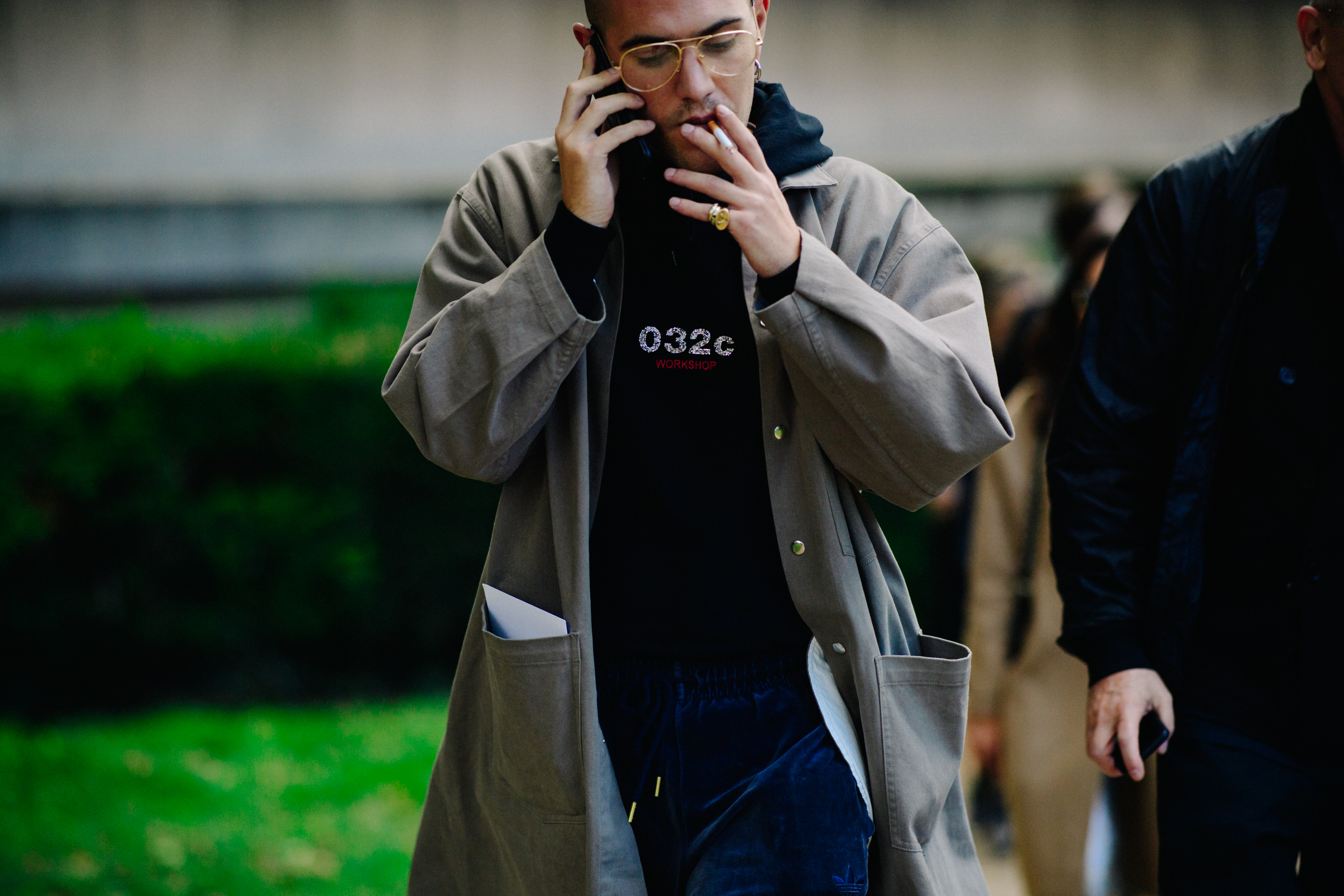 032C fashion editor wearing rain coat