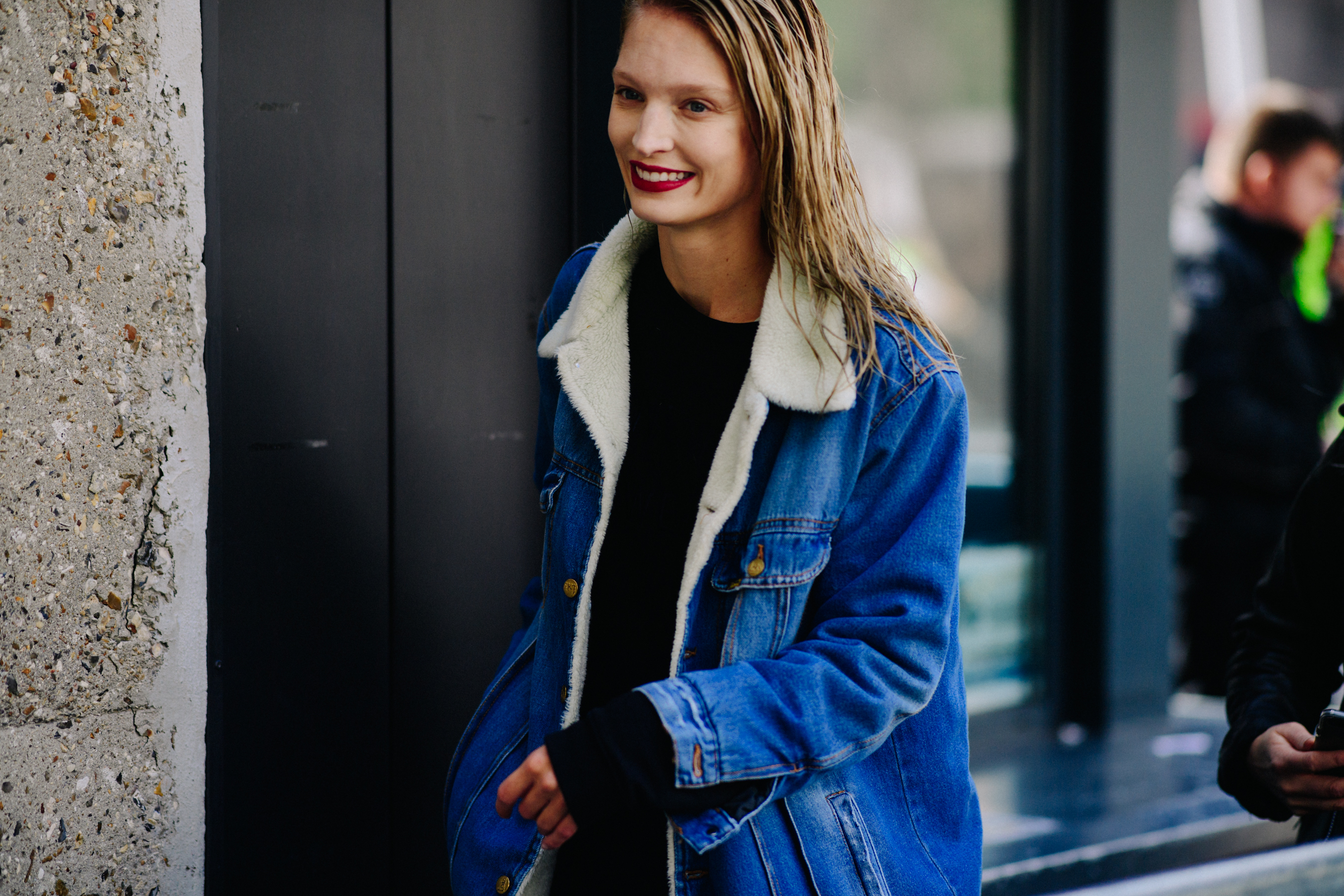 Model wearing blue denim jacket