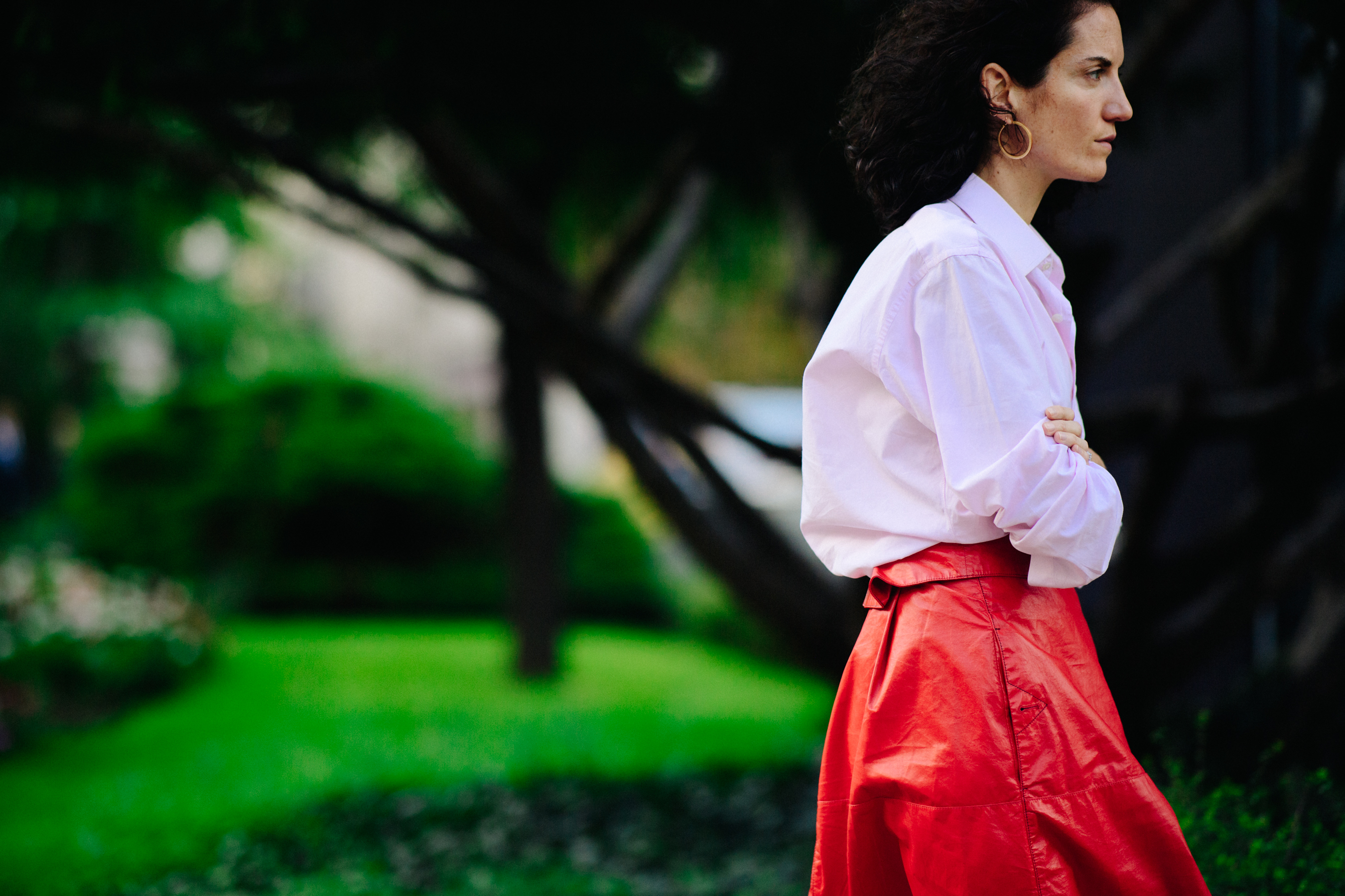 Woman wearing red leather skirt