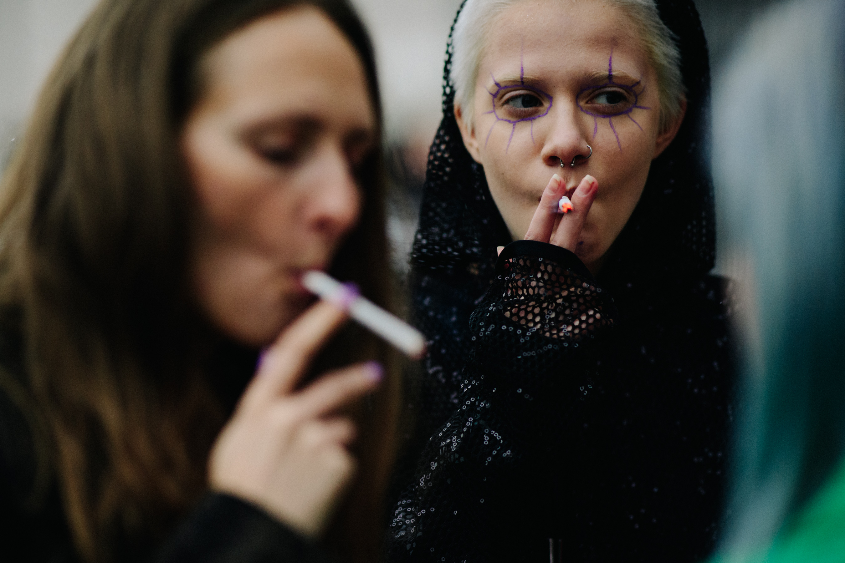Closeup of two women smoking