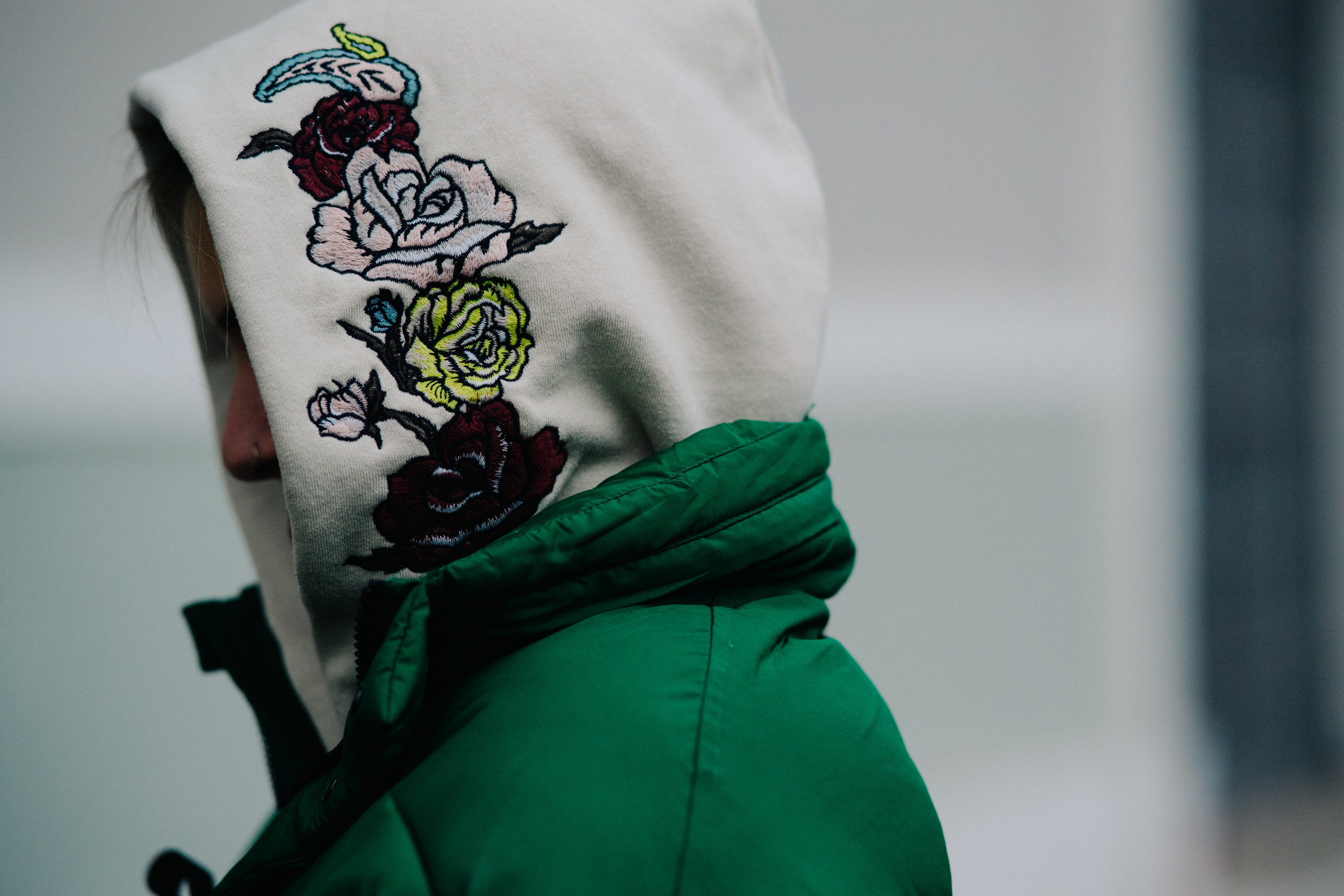 Closeup of girl in floral hoodie