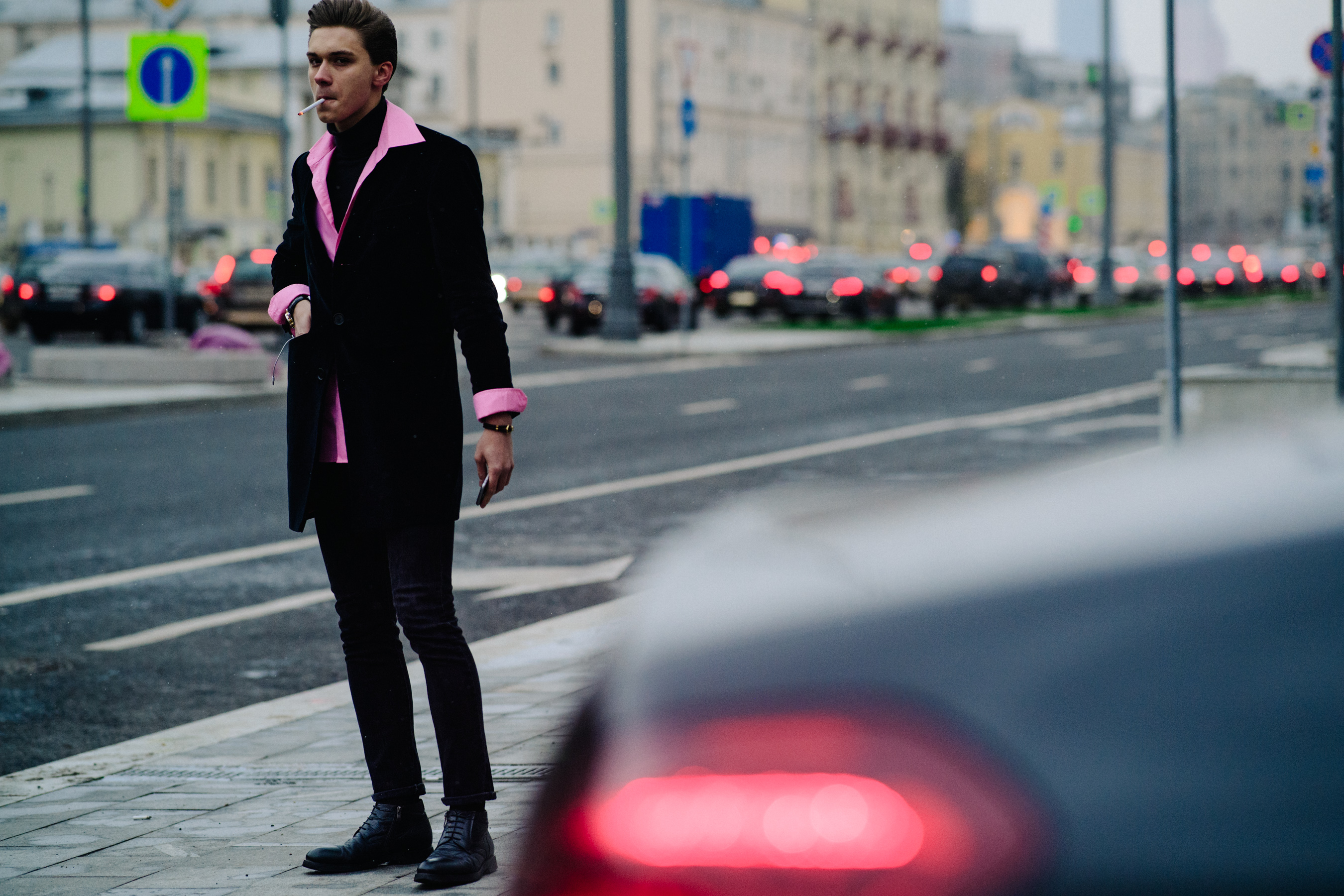 Man wearing pink shirt