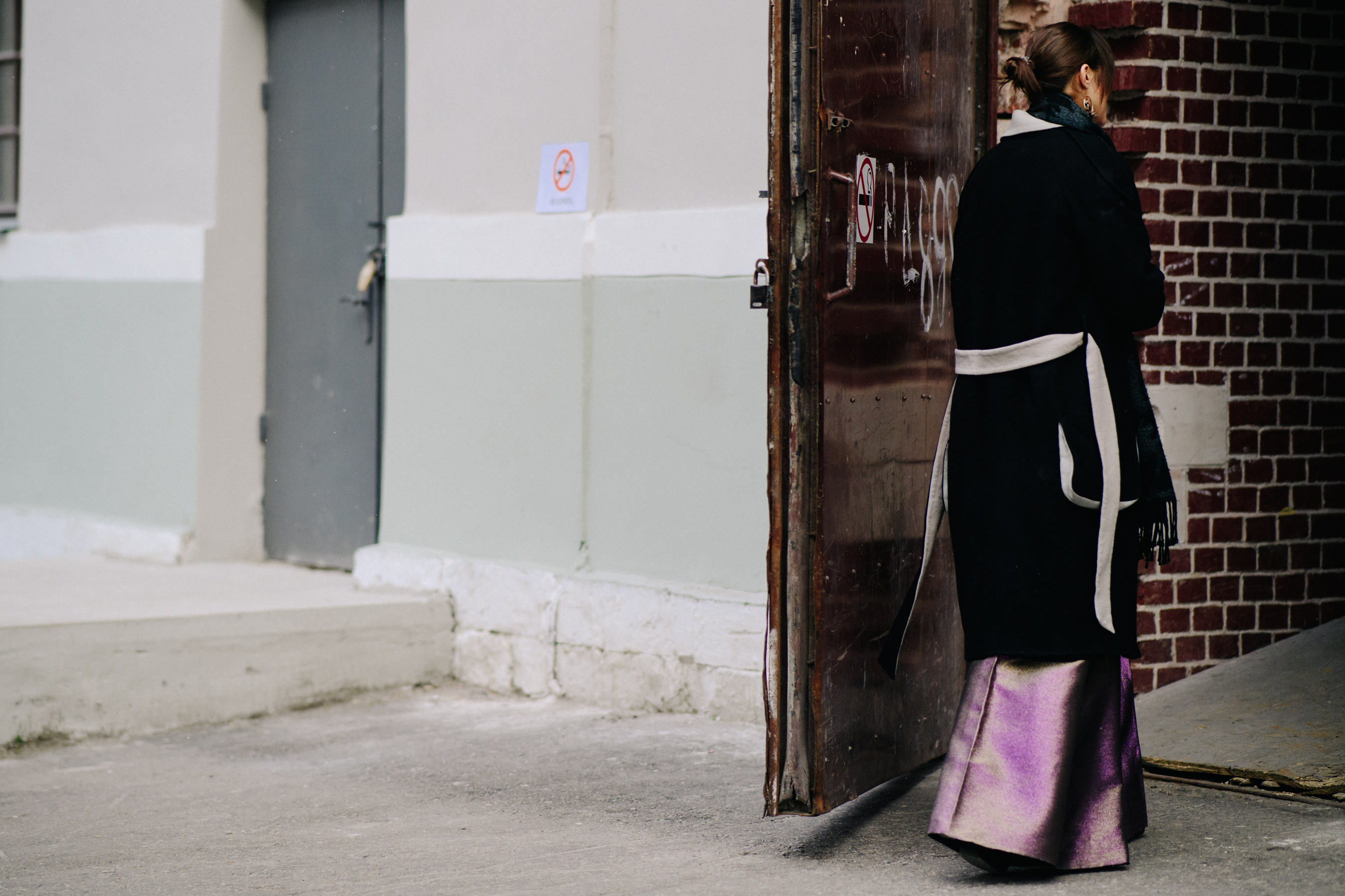 Woman wearing black wool coat