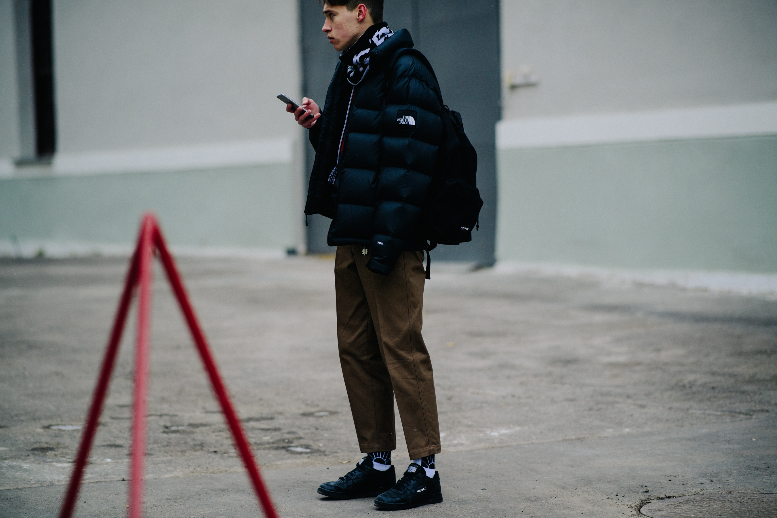Man wearing black winter coat