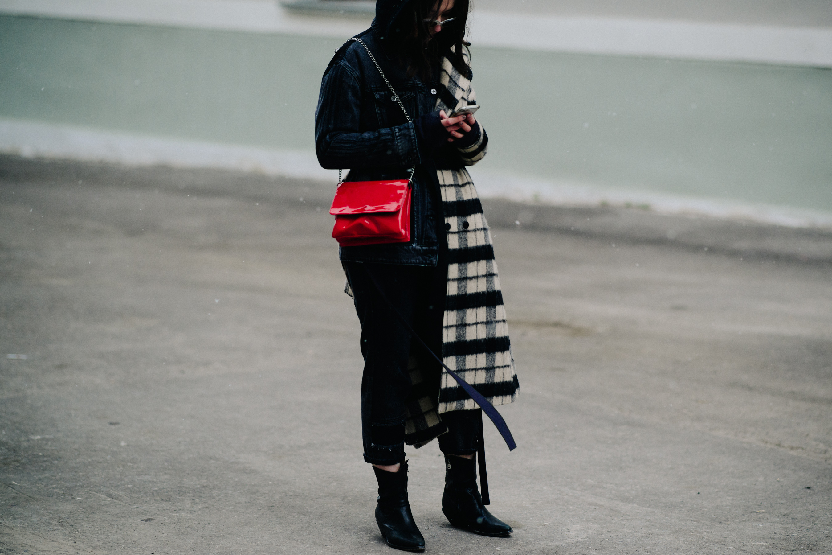 Woman with long check scarf