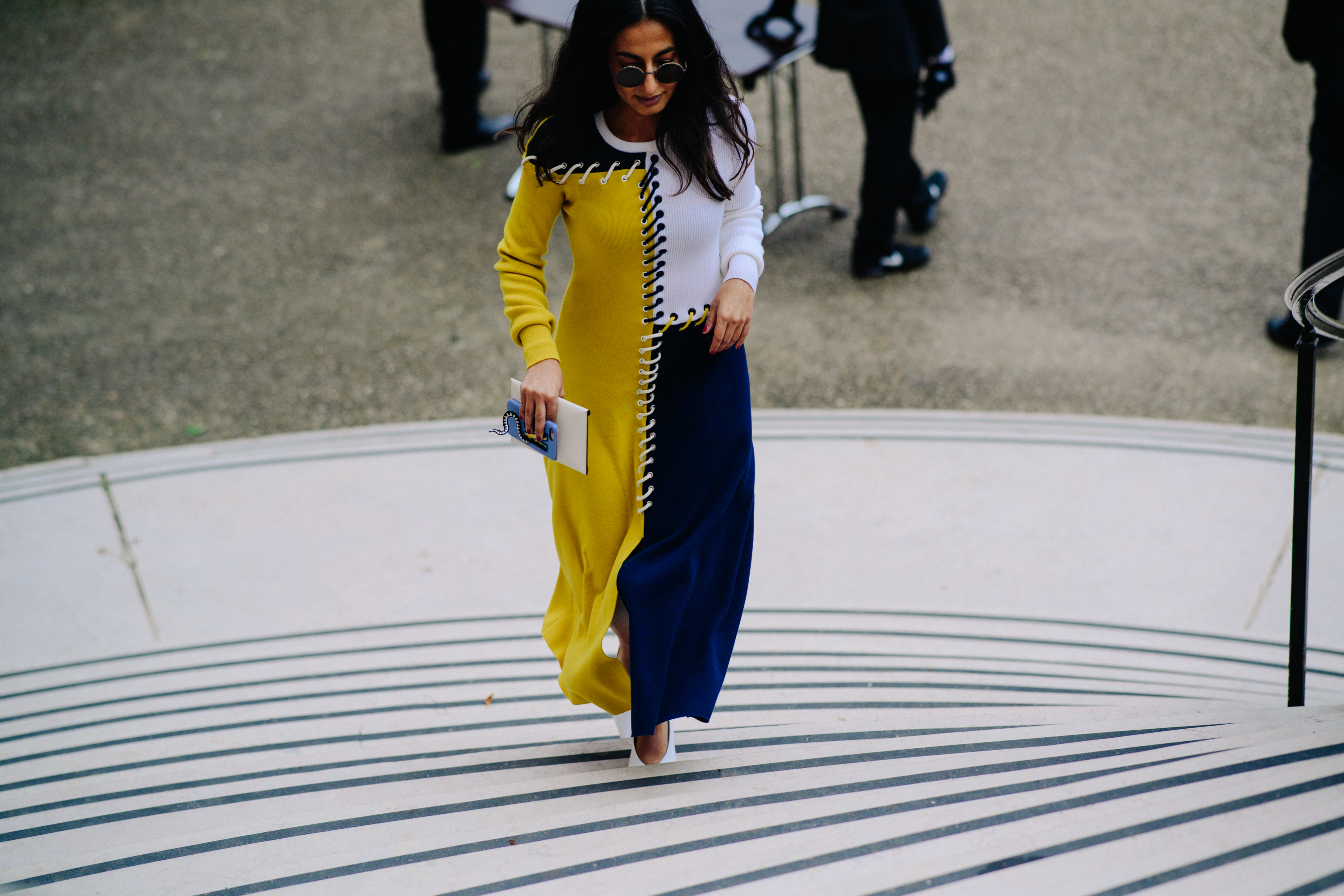 Woan wearing stitched dress