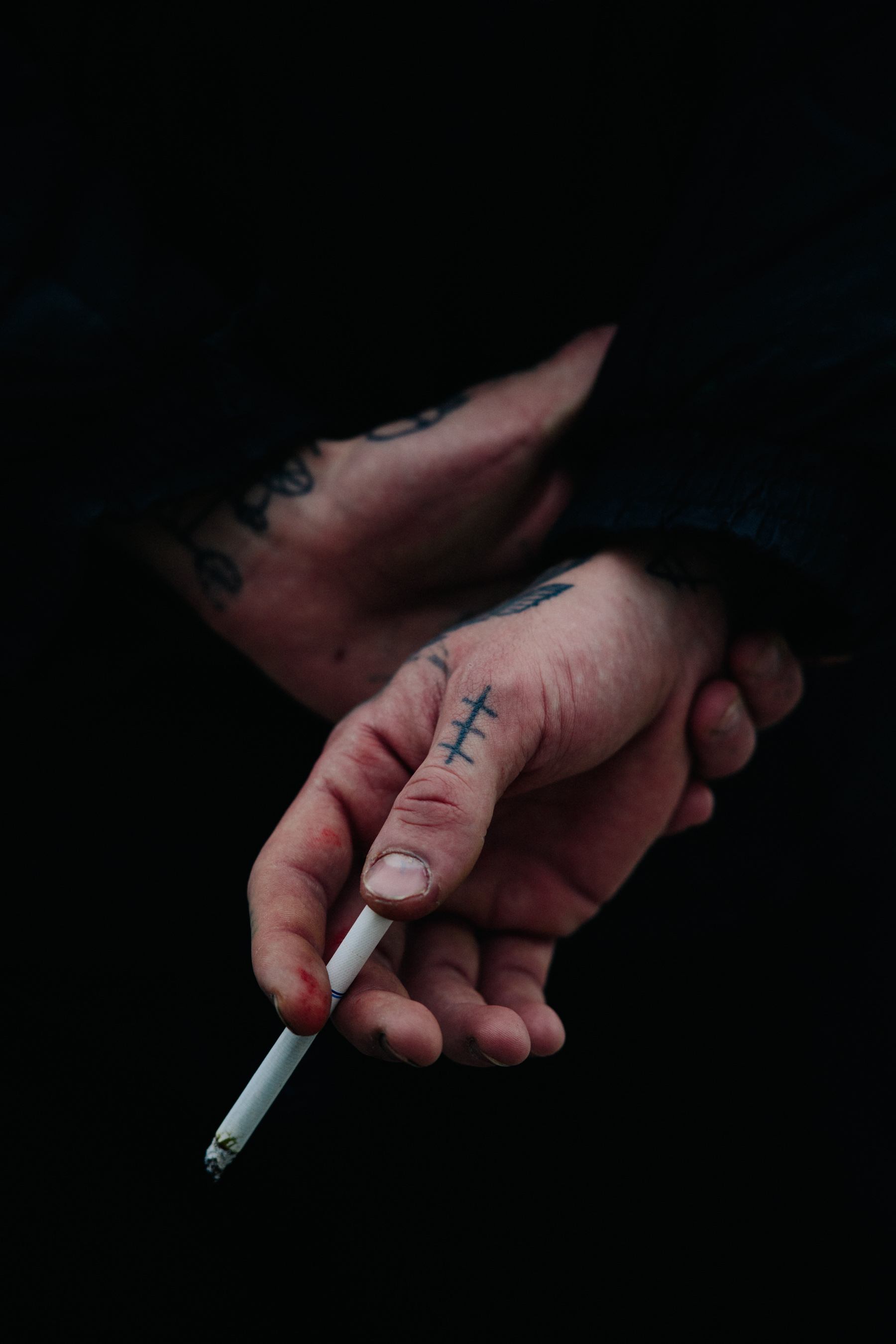 Closeup on tattooed hands