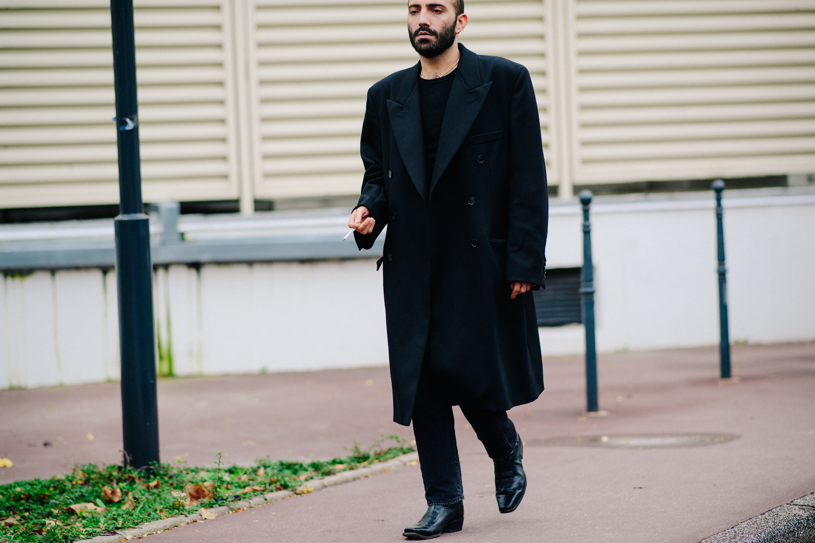 French photographer wearing black coat