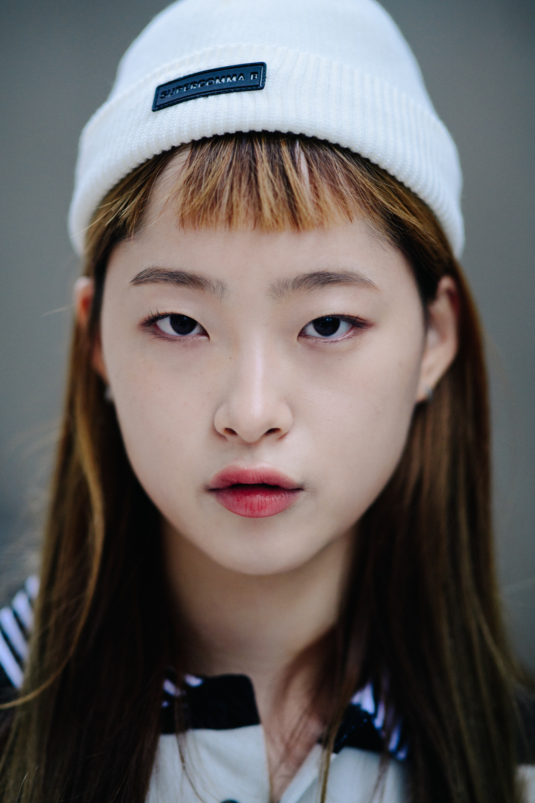 Portrait of Asian model with white beanie