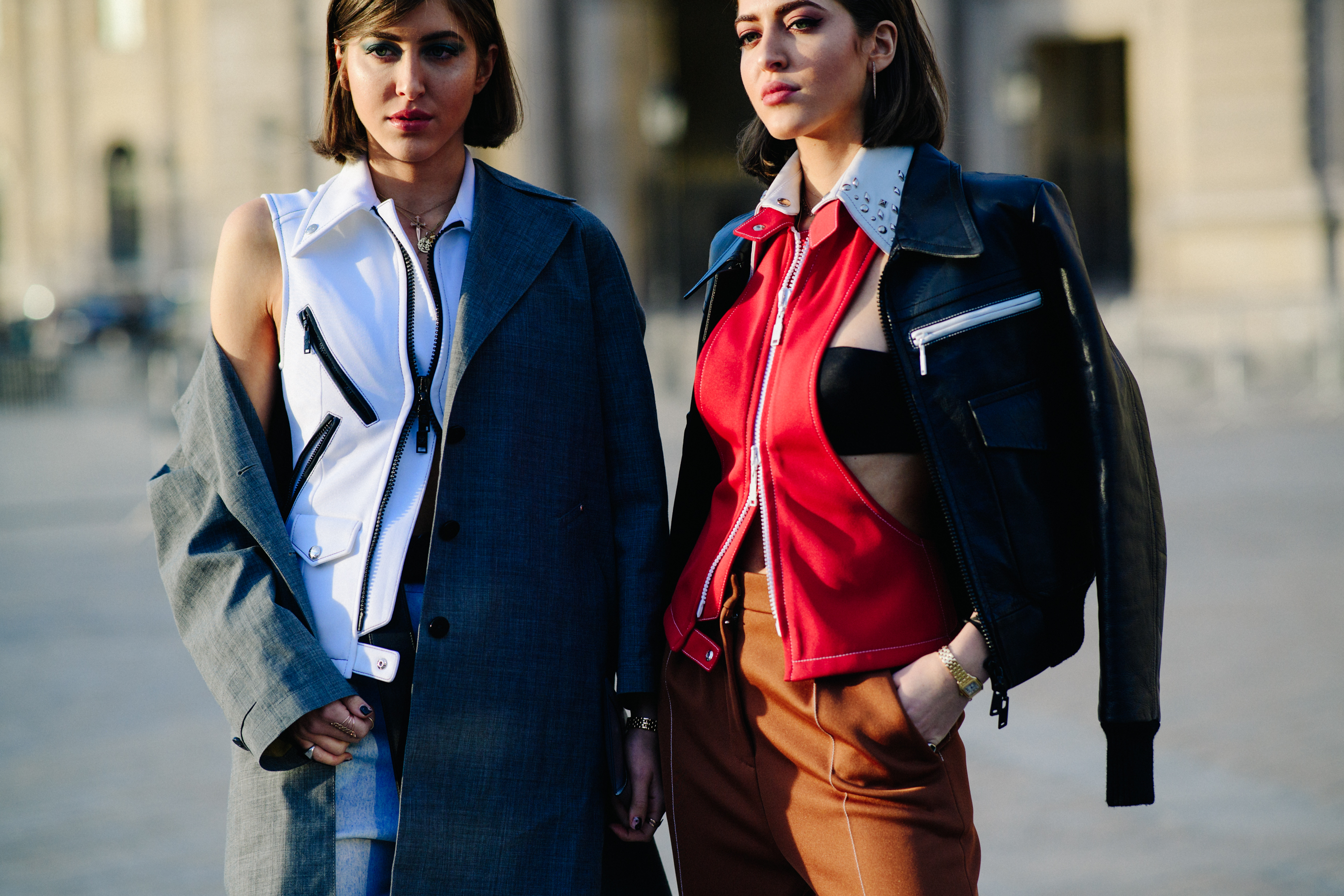 Two women wearing colourful clothes
