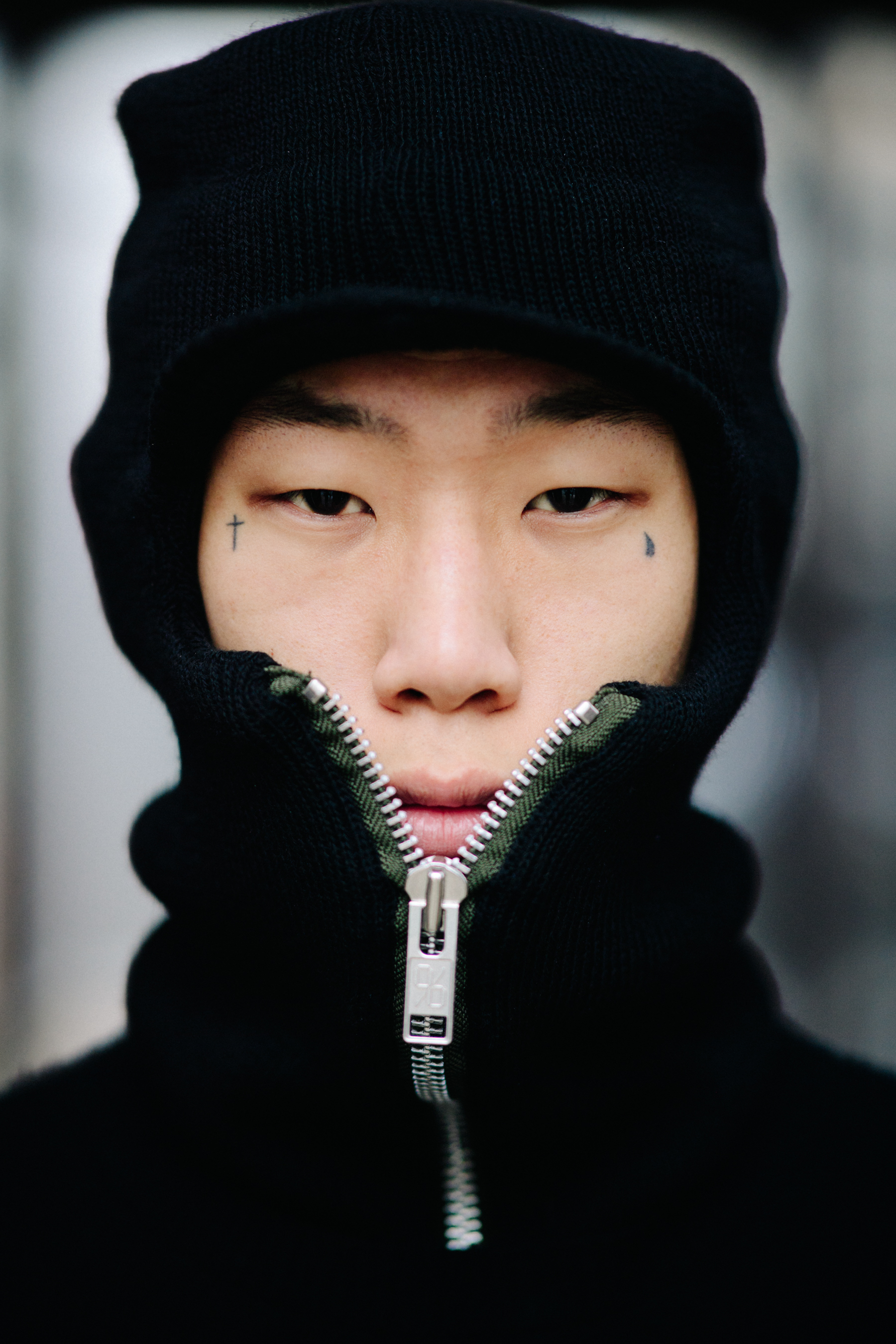 Portrait of Asian model wearing balaclava