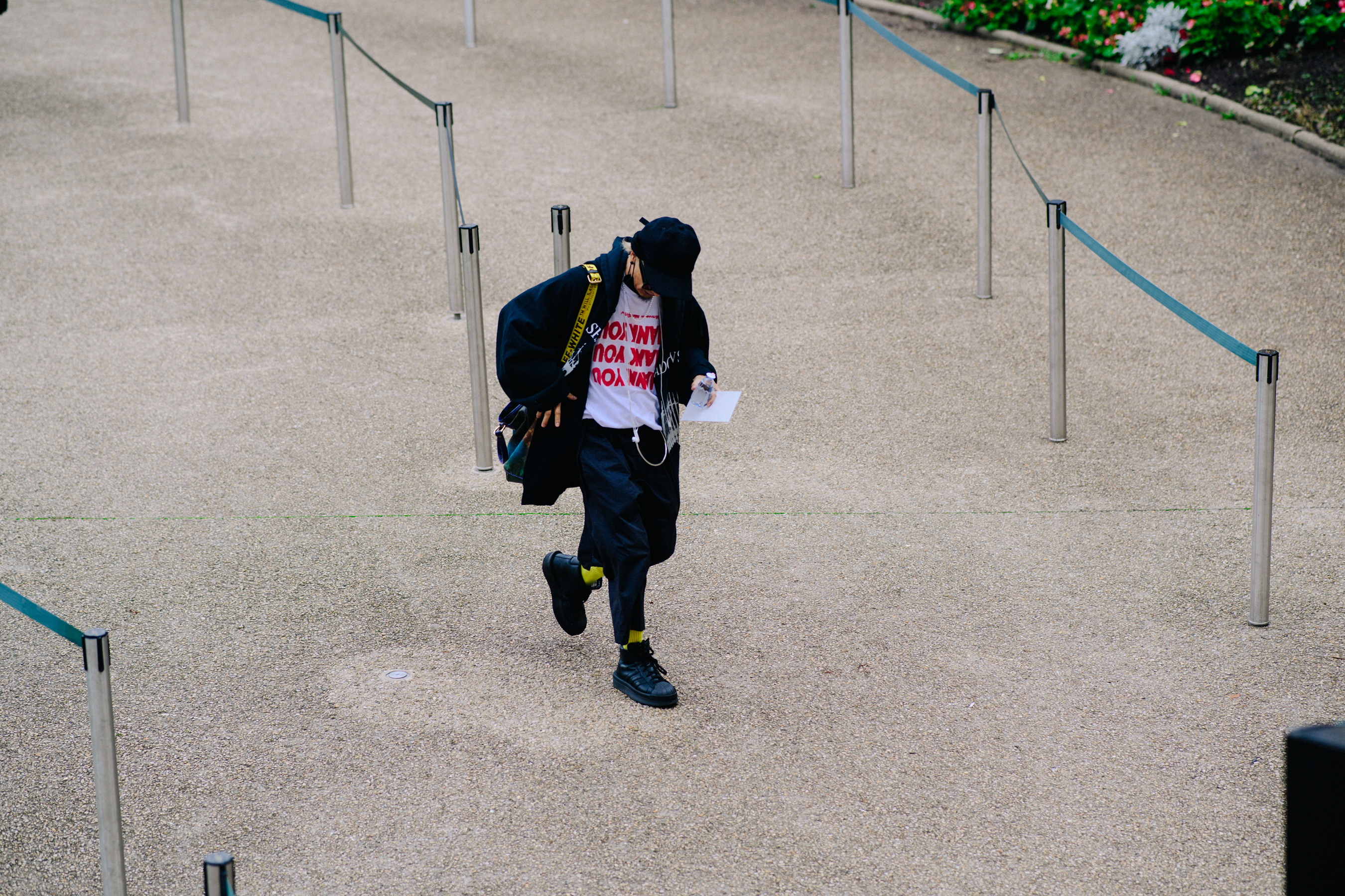Man wearing Supreme t-shirt