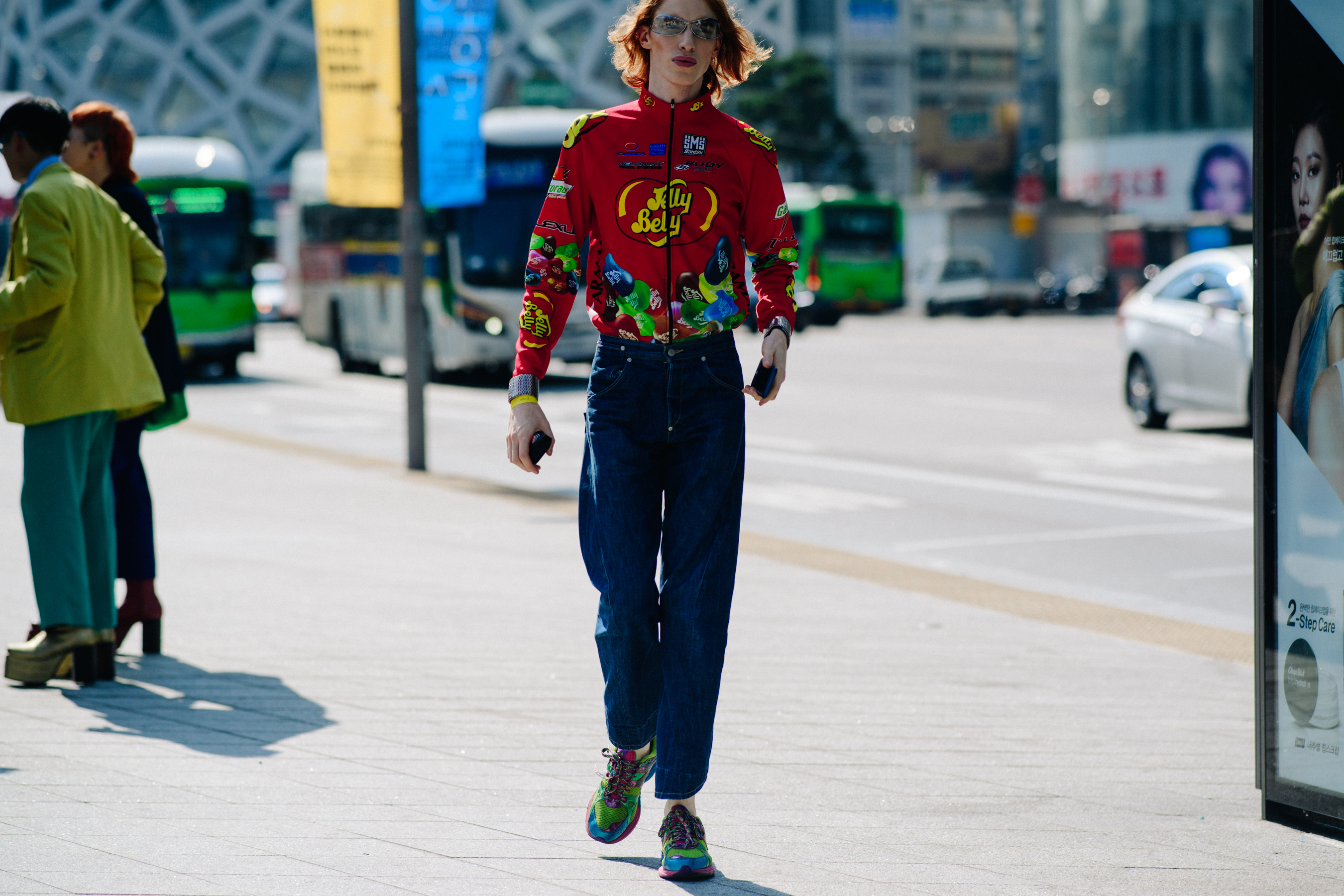 Model wearing colourful cycling jacket