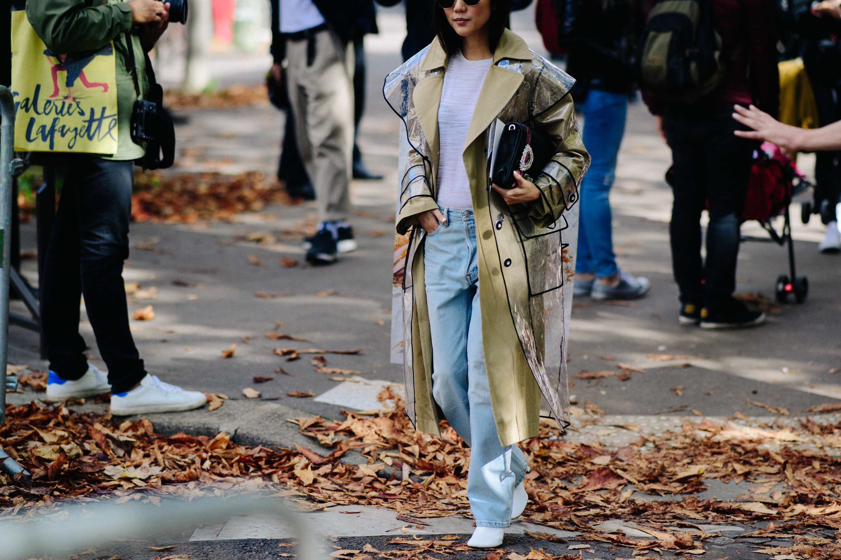 Blogger wearing transparent coat
