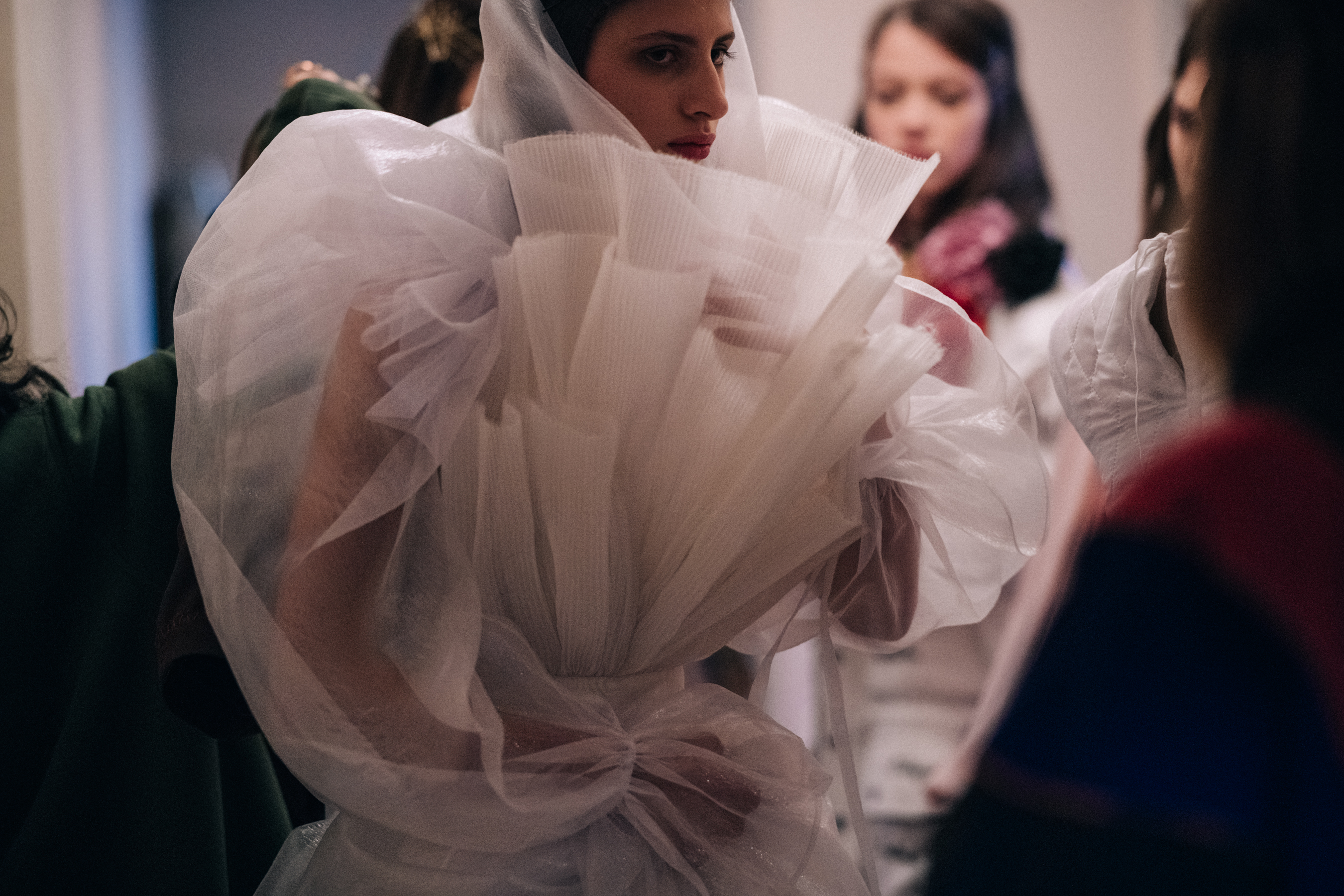 Model Beatrice Klimenko wearing white dress