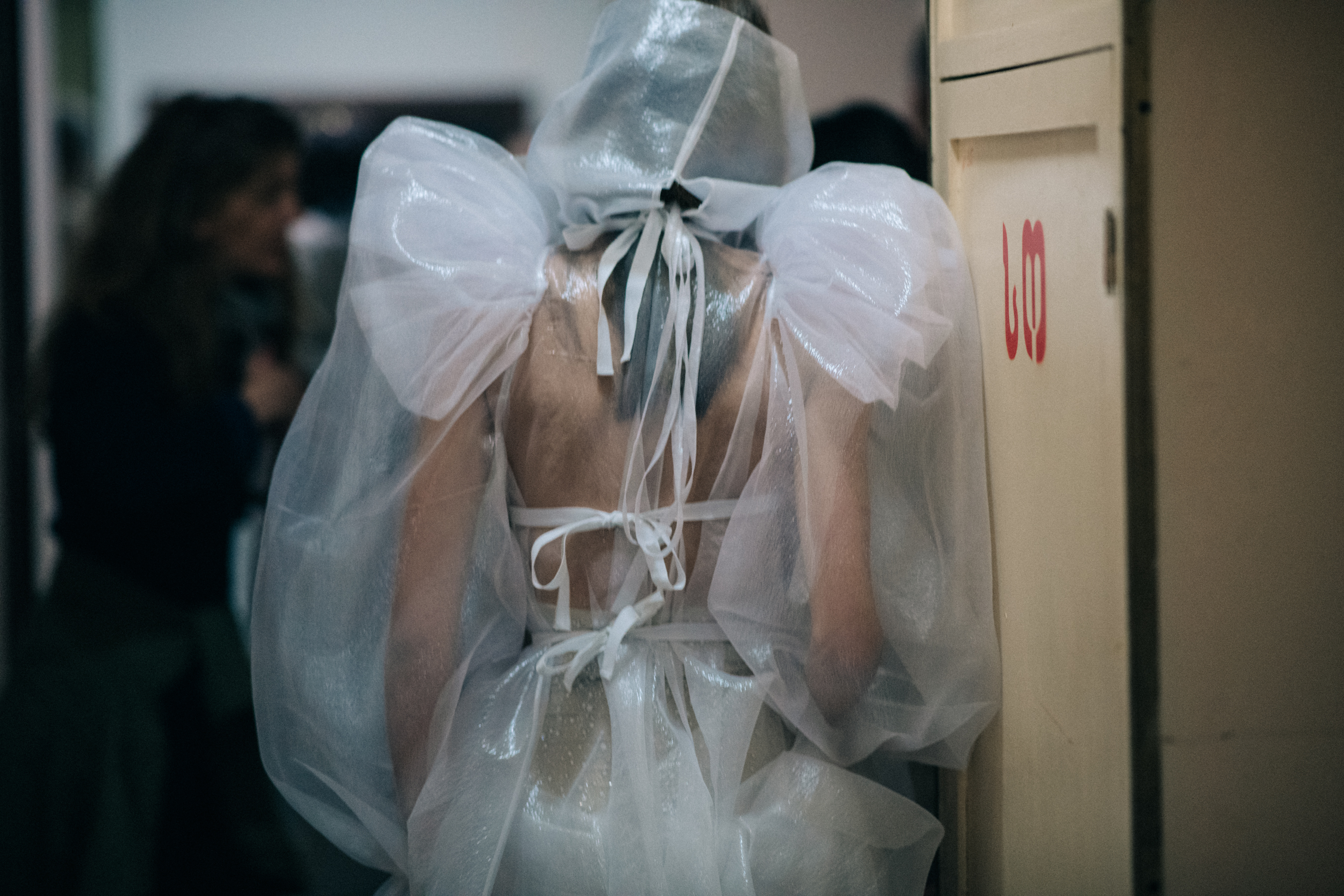 Model Beatrice Klimenko wearing white dress