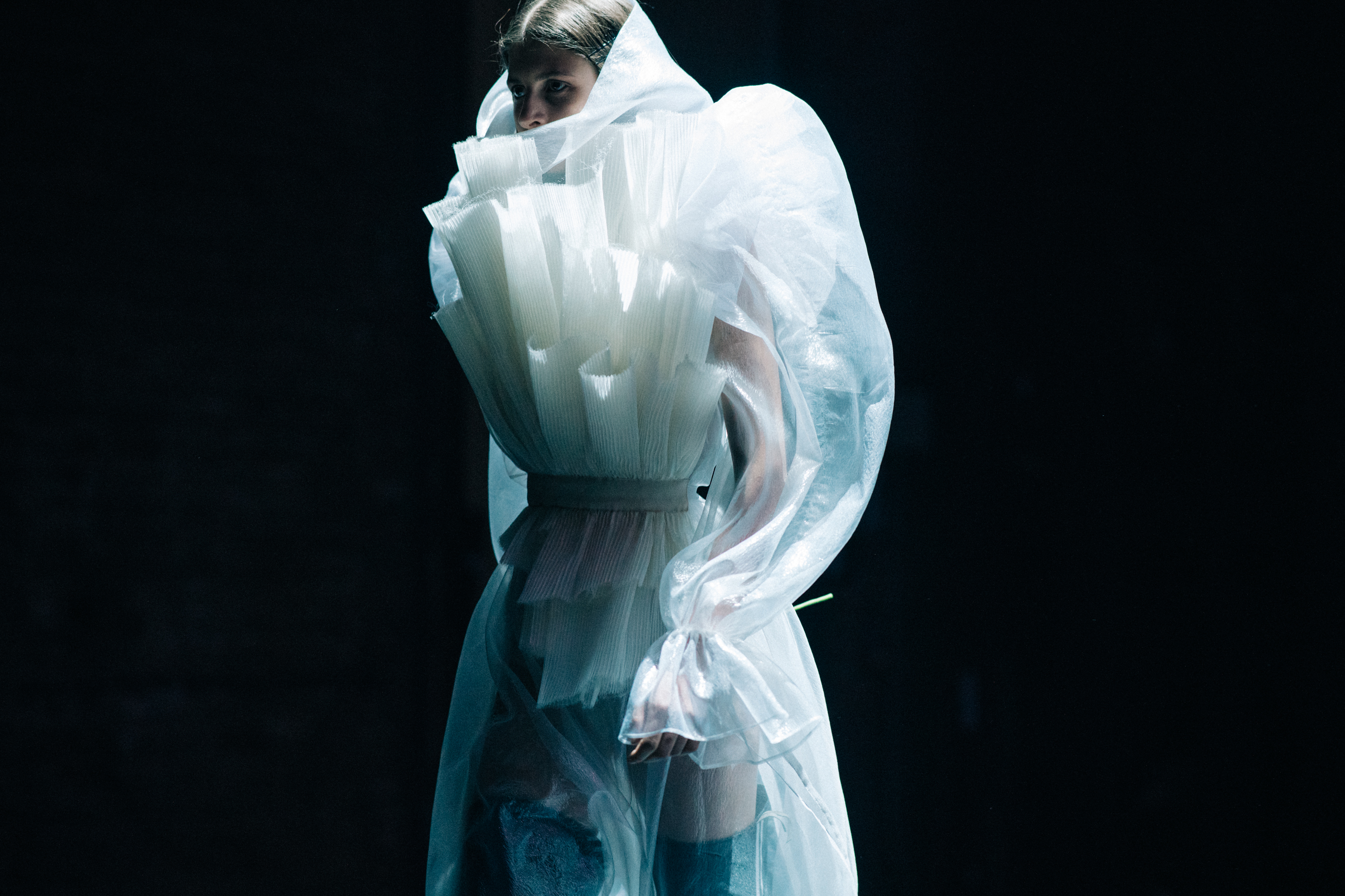 Model Beatrice Klimenko wearing white dress