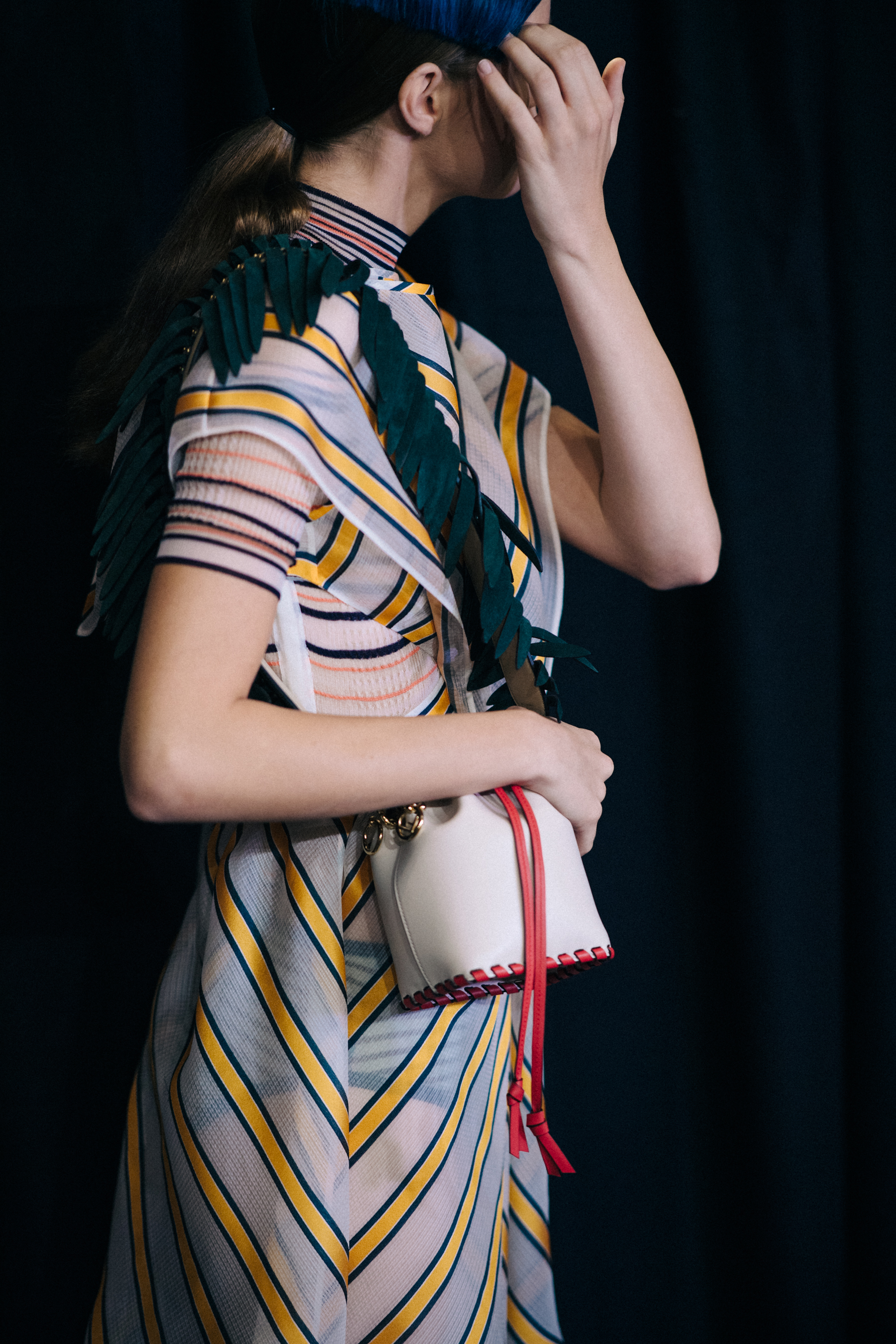 Model backstage in Fendi outfit