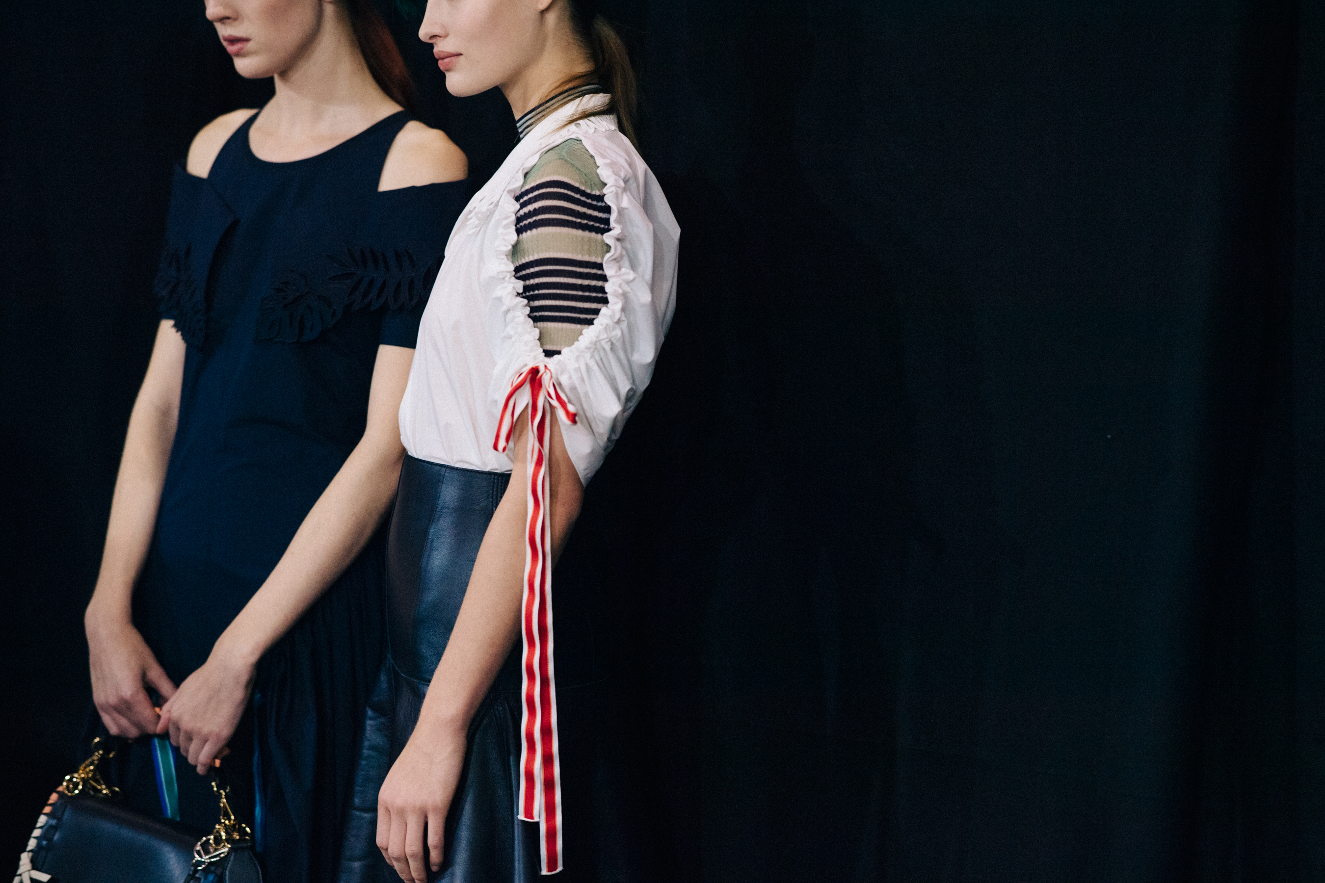 Two models backstage in Fendi outfit