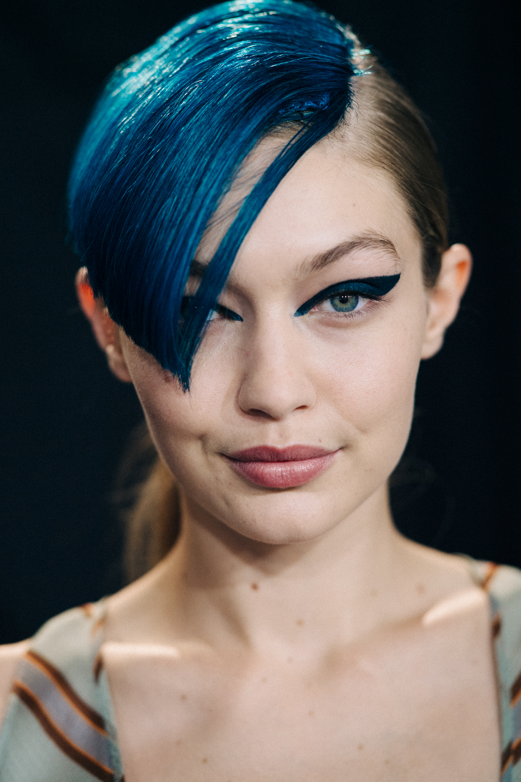 Portrait of American model with blue fringe
