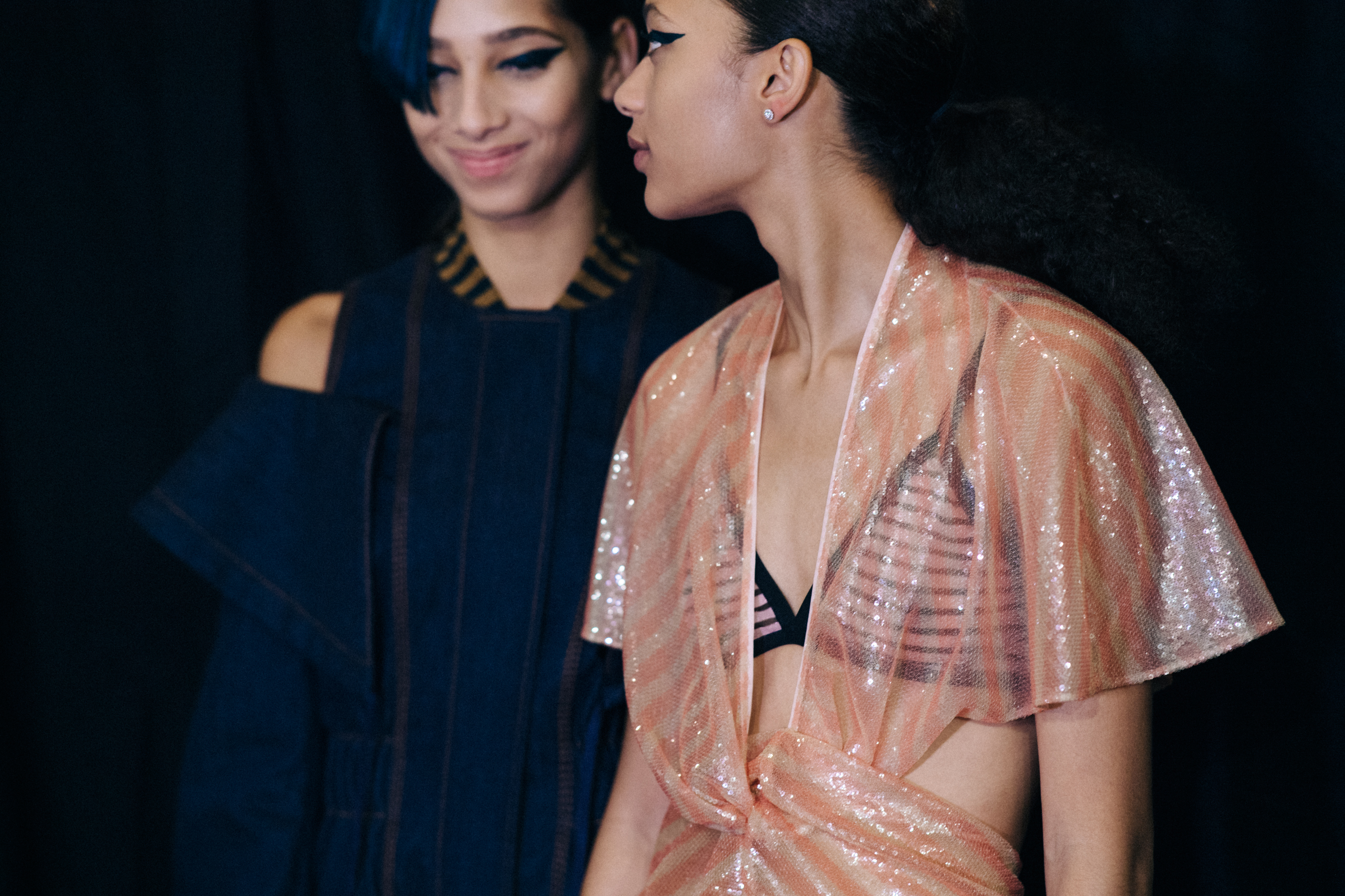 Two models backstage in Fendi outfit