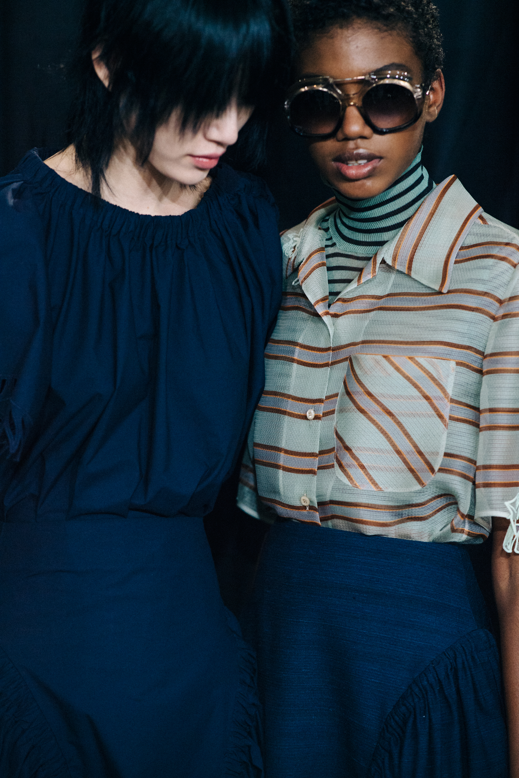 Two models in Fendi outfits