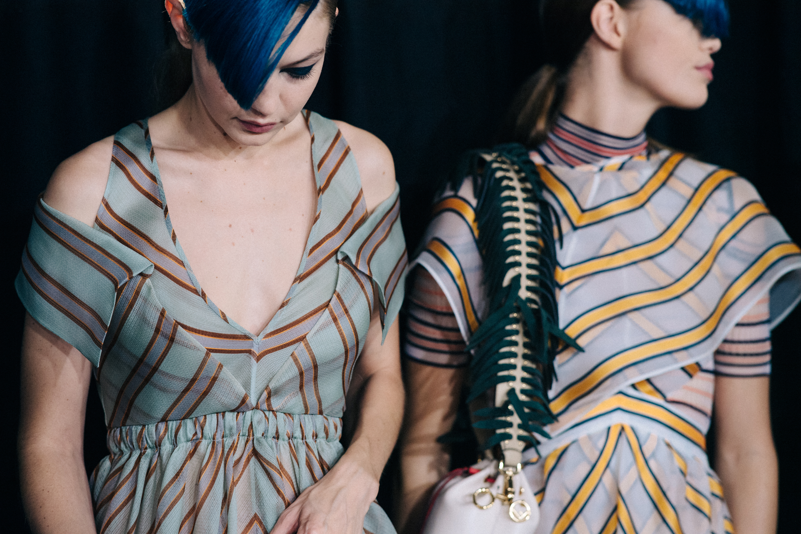 Two models backstage in Fendi outfit