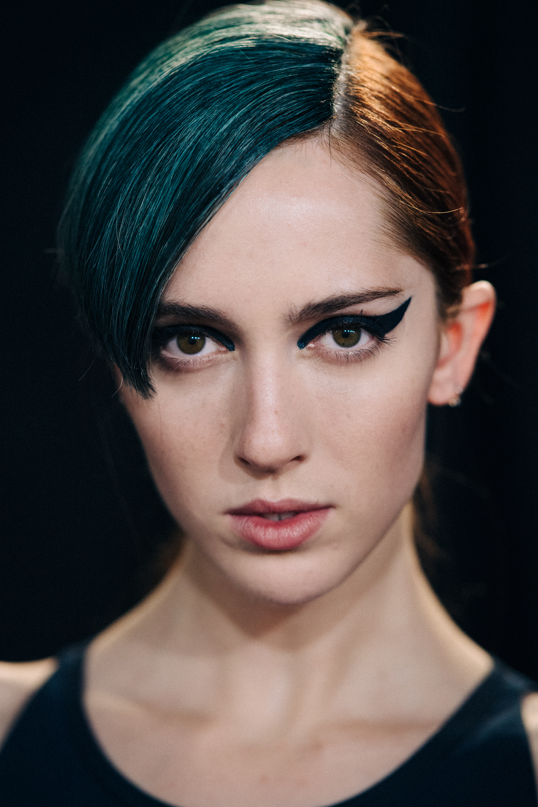 Portrait of American model with blue fringe