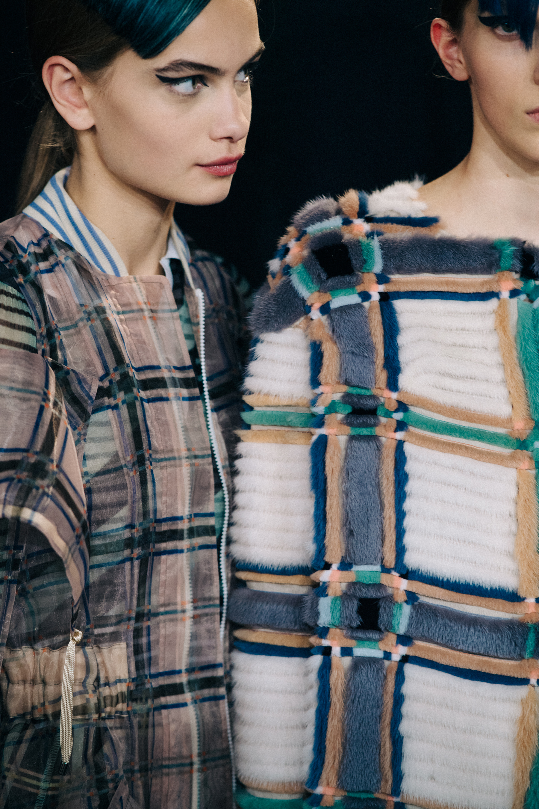 Two models backstage at Fendi