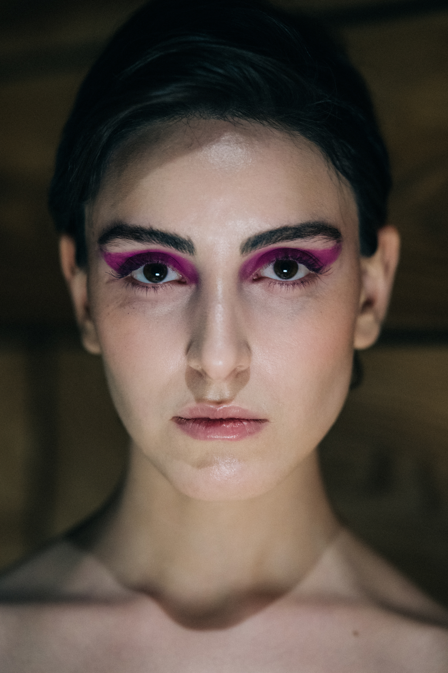 Portrait of model with purple eye makeup