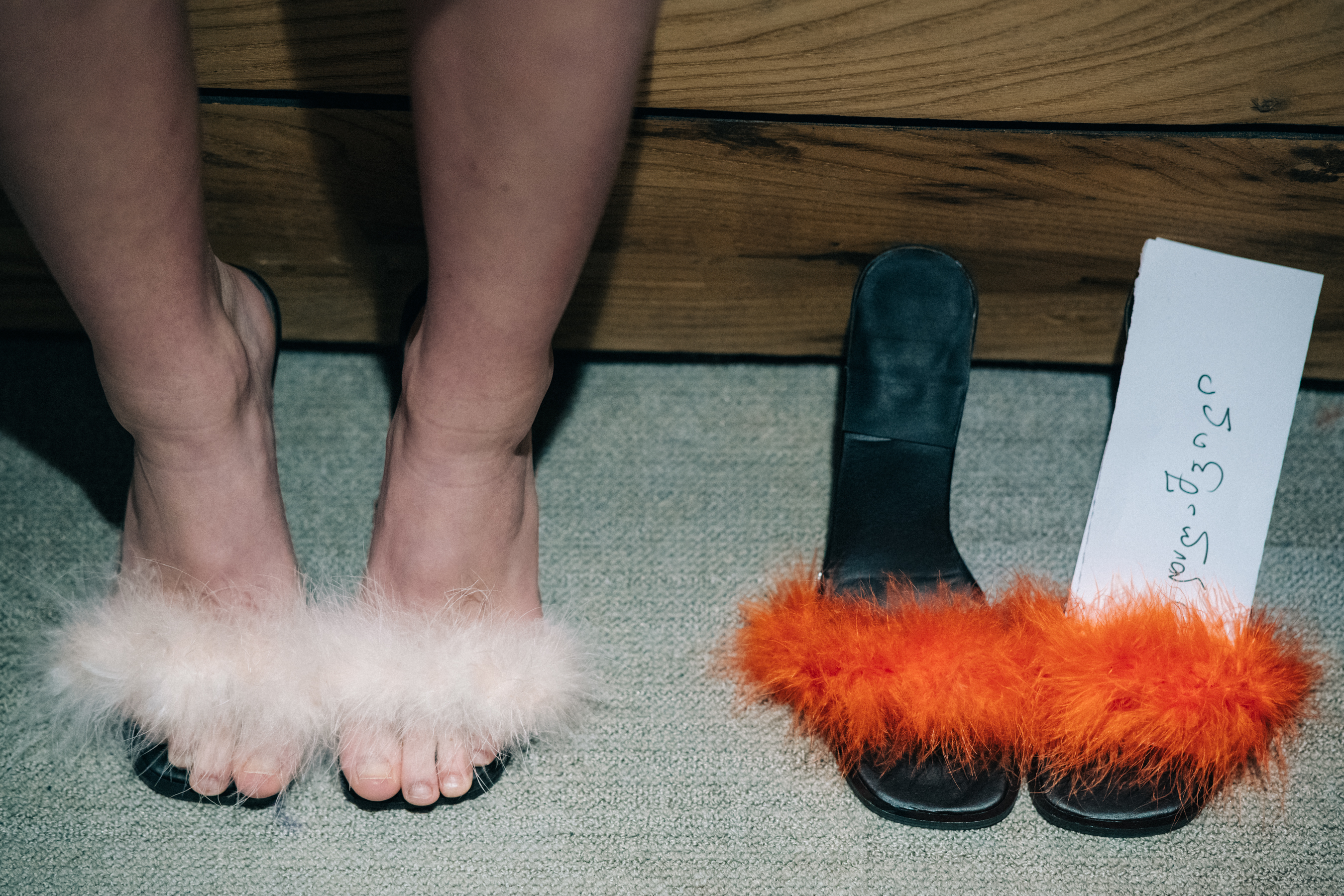 Models feet in fur heels