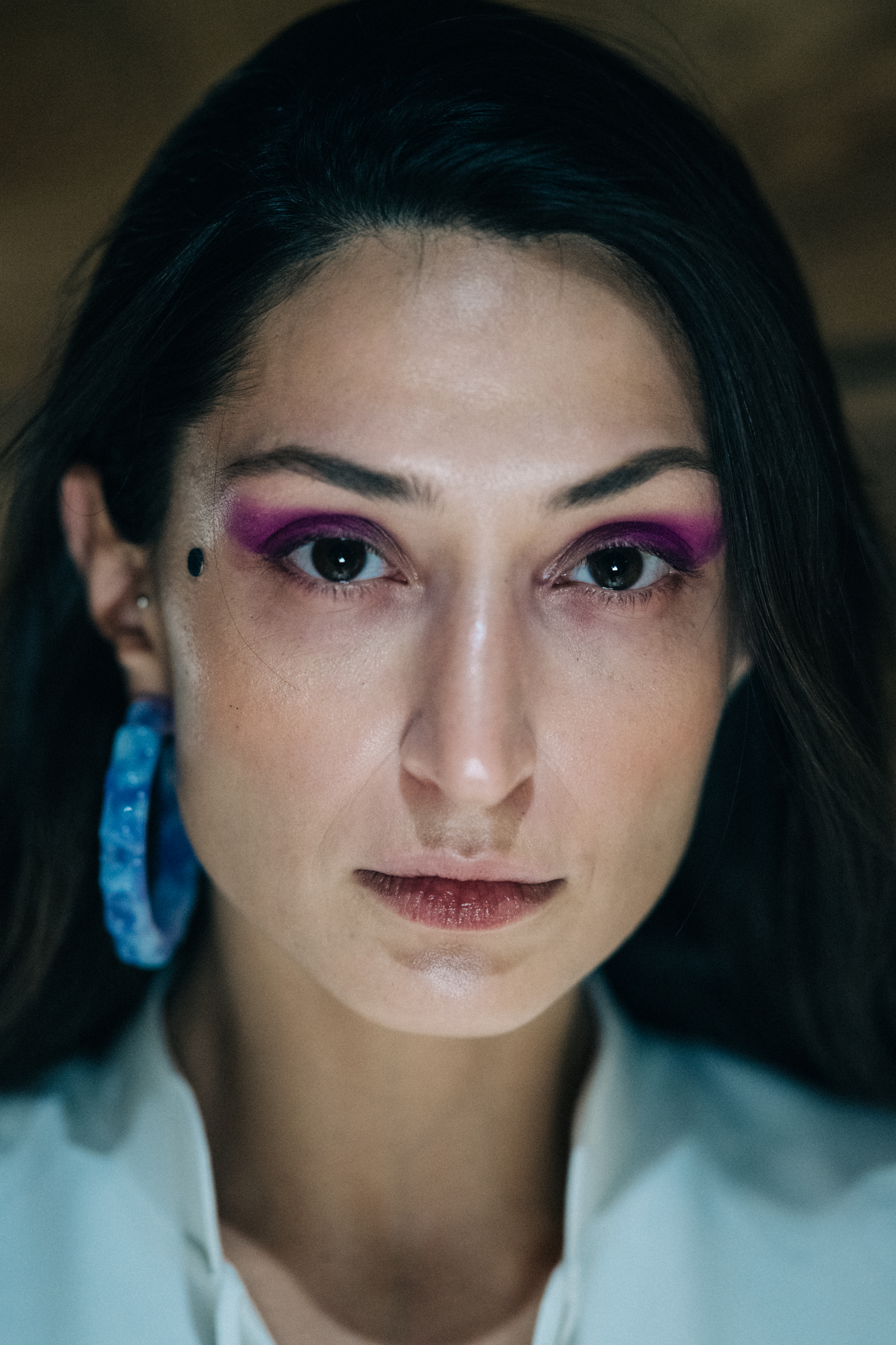 Portrait of Georgian model with purple eye makeup